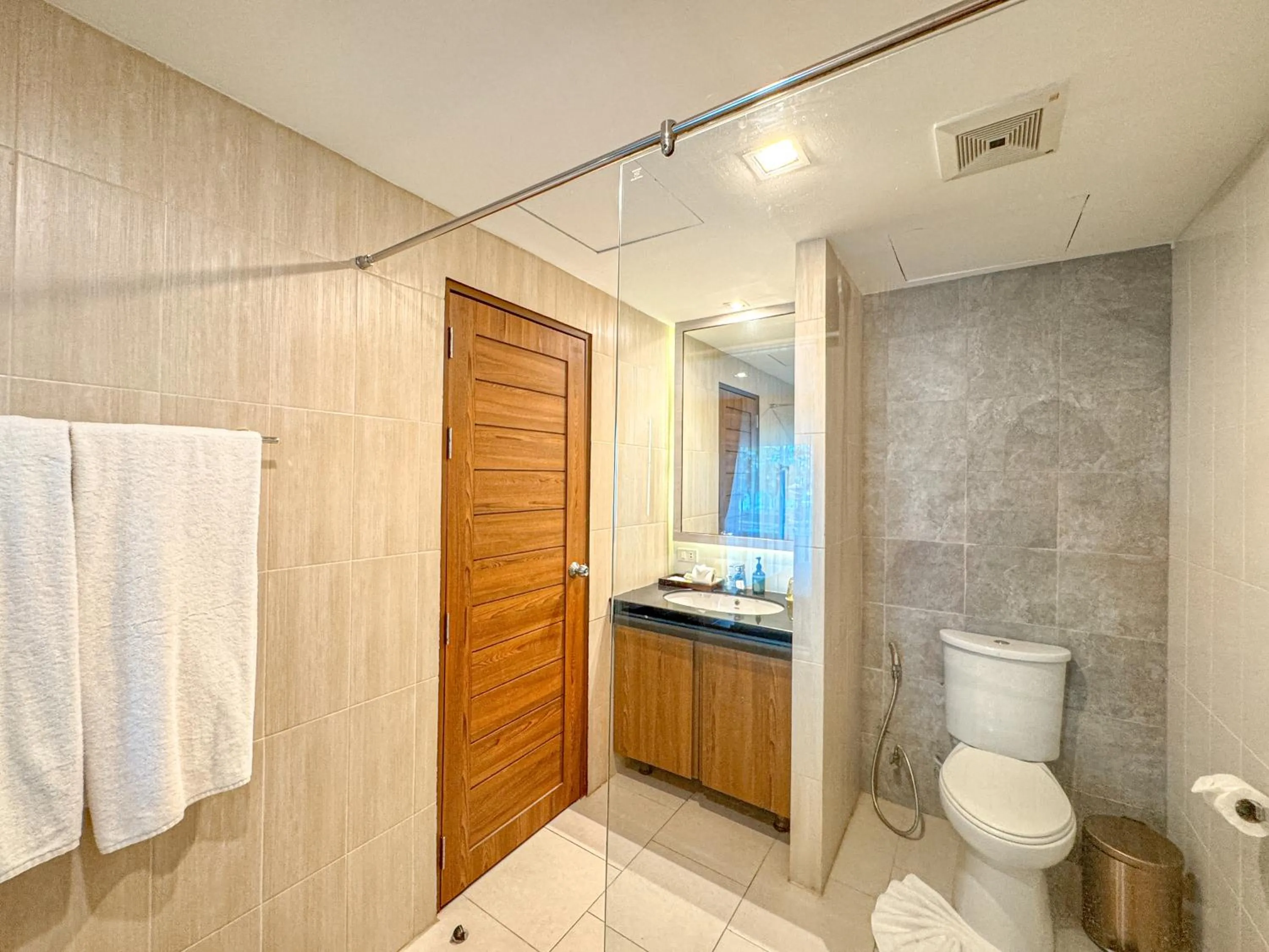 Shower in Quality Beach Resorts and Spa Patong