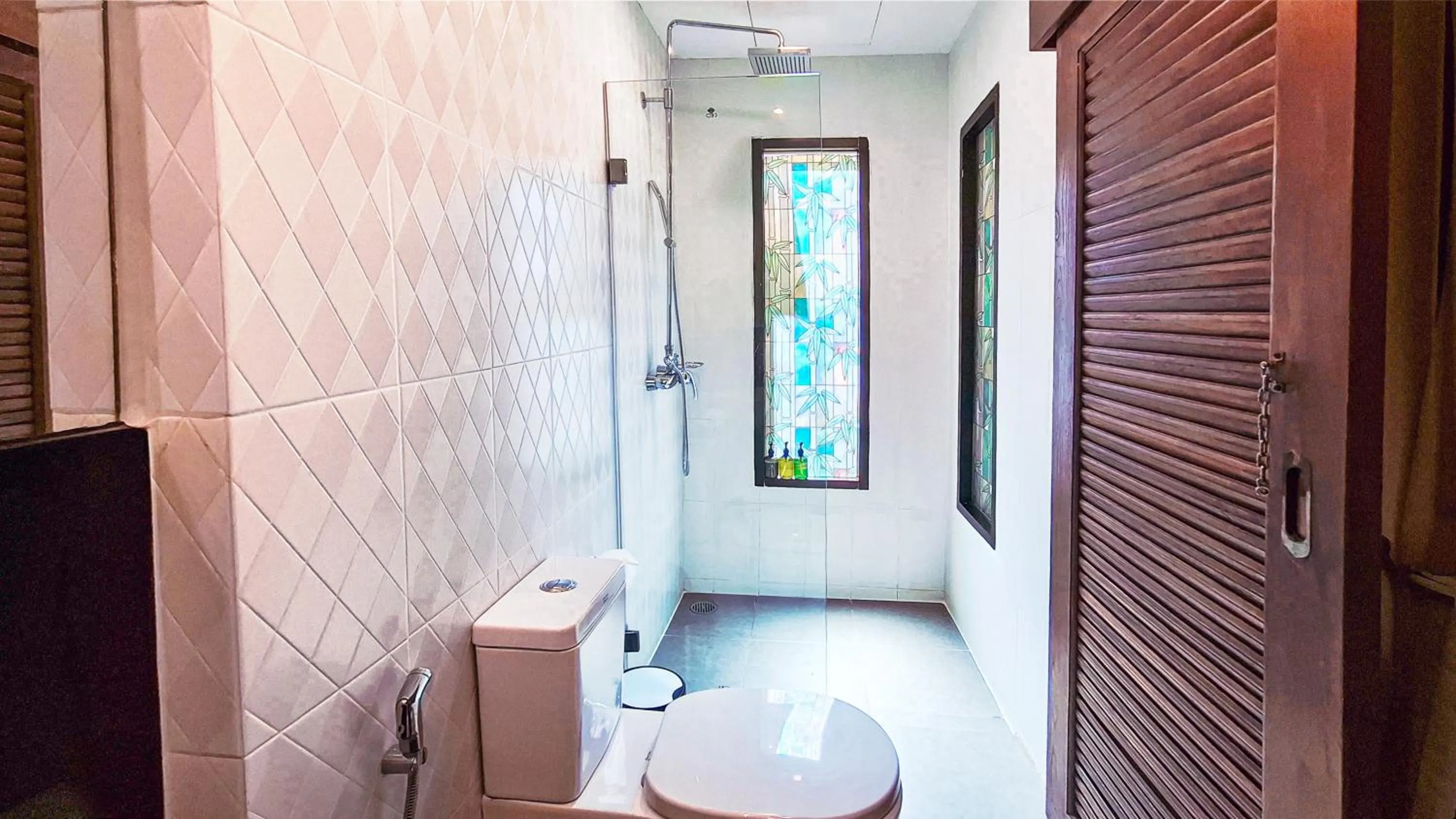 Shower in Quality Beach Resorts and Spa Patong