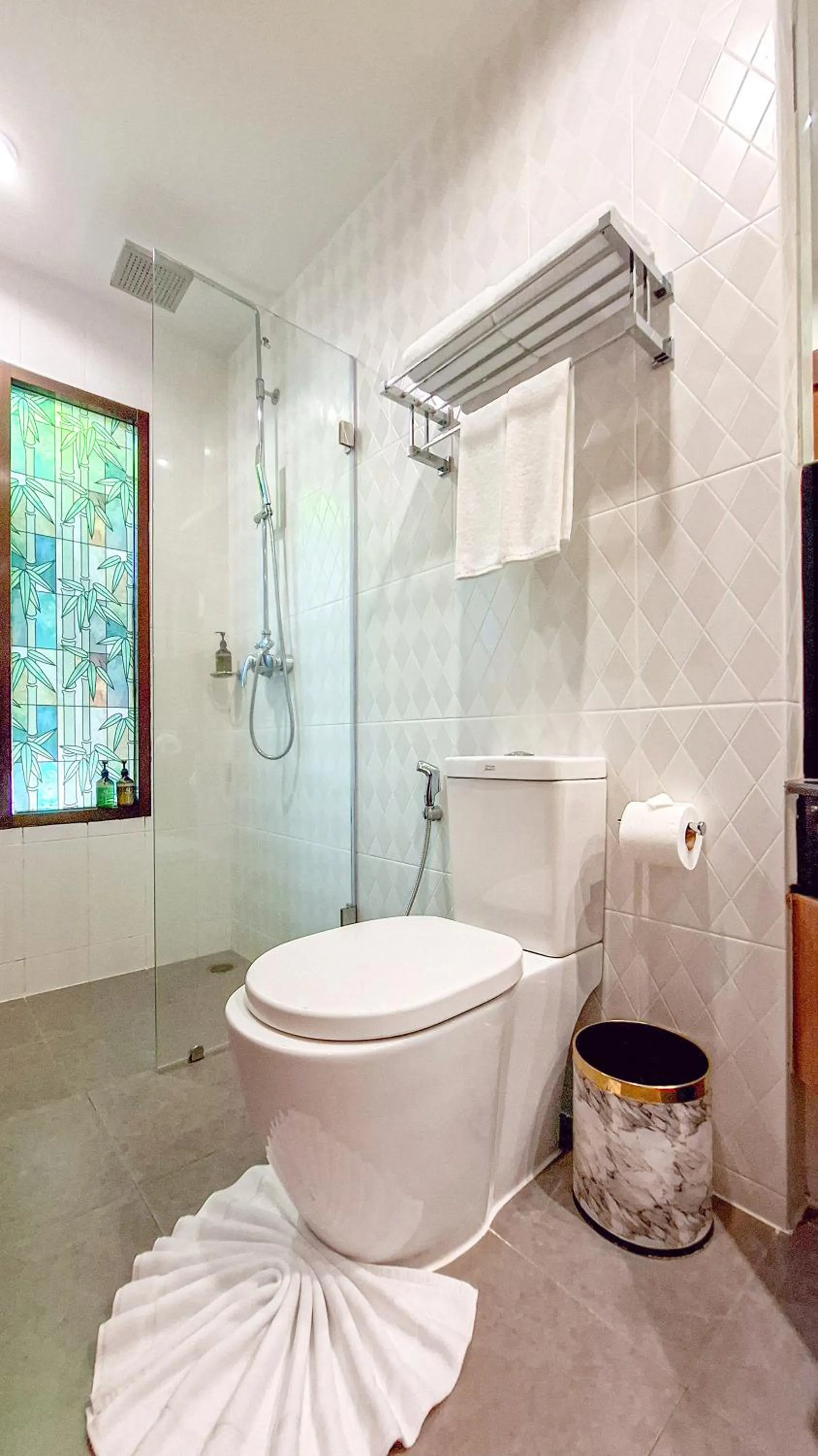 Shower in Quality Beach Resorts and Spa Patong