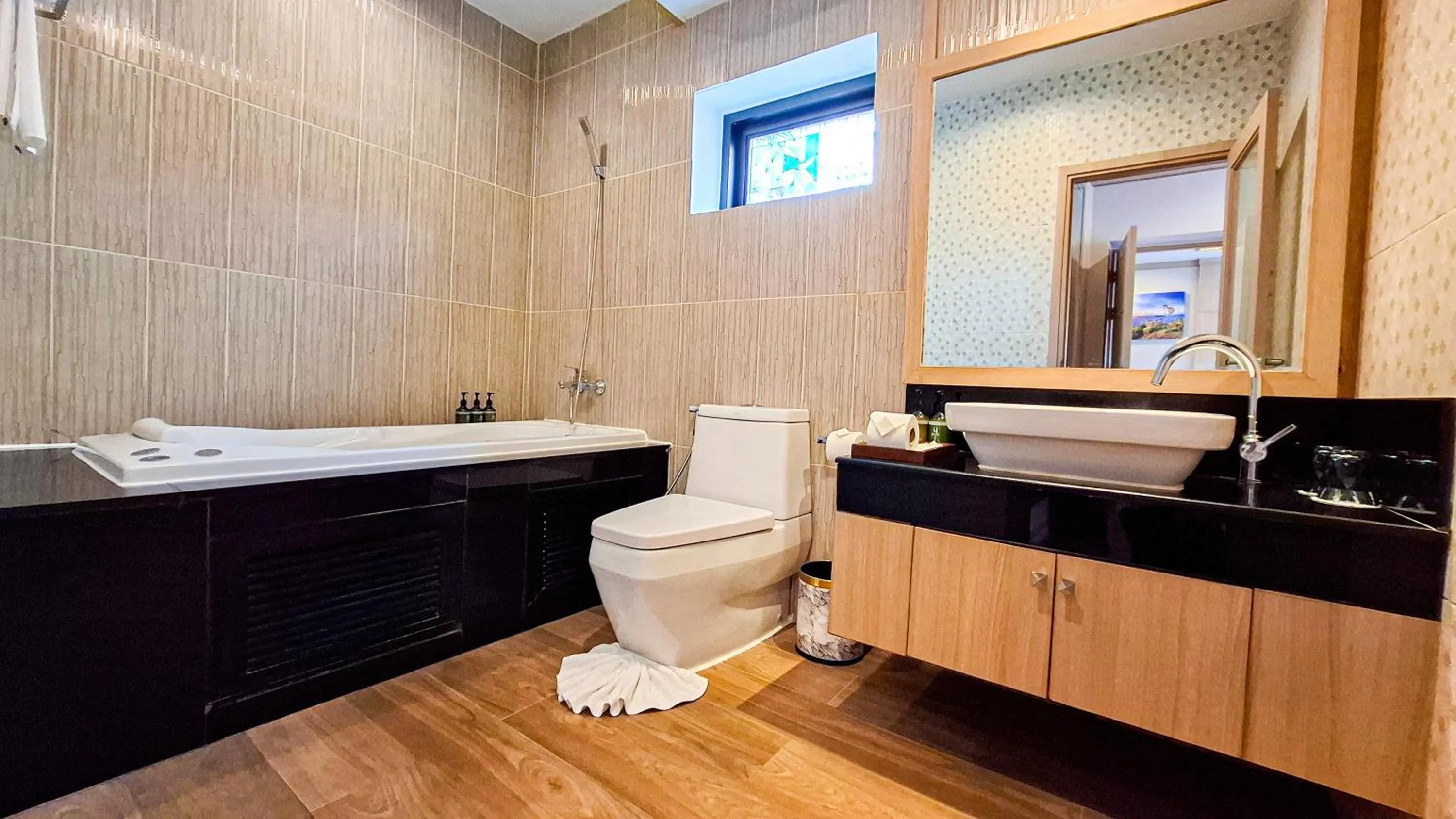 Shower in Quality Beach Resorts and Spa Patong