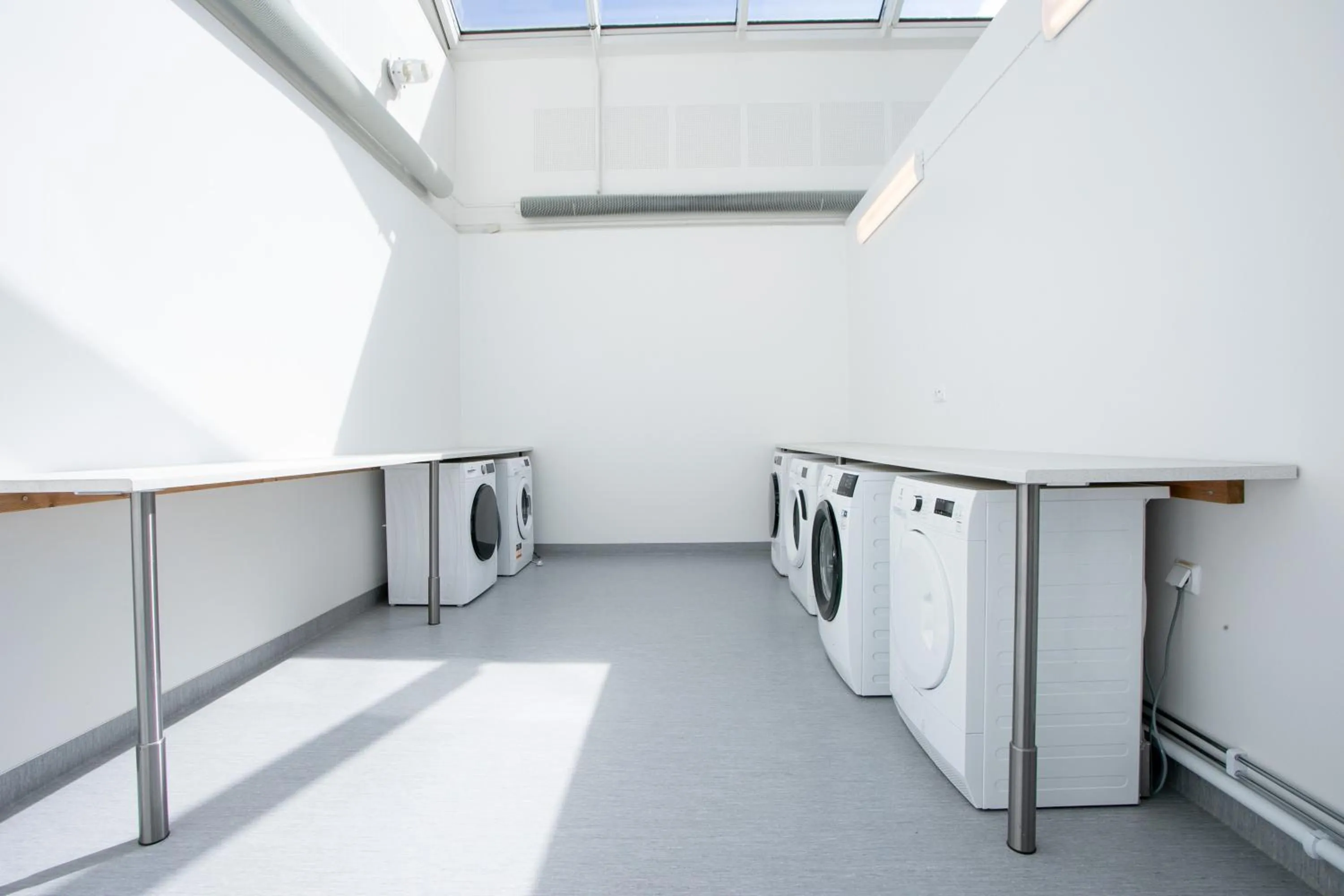 washing machine in ApartDirect Arlandastad