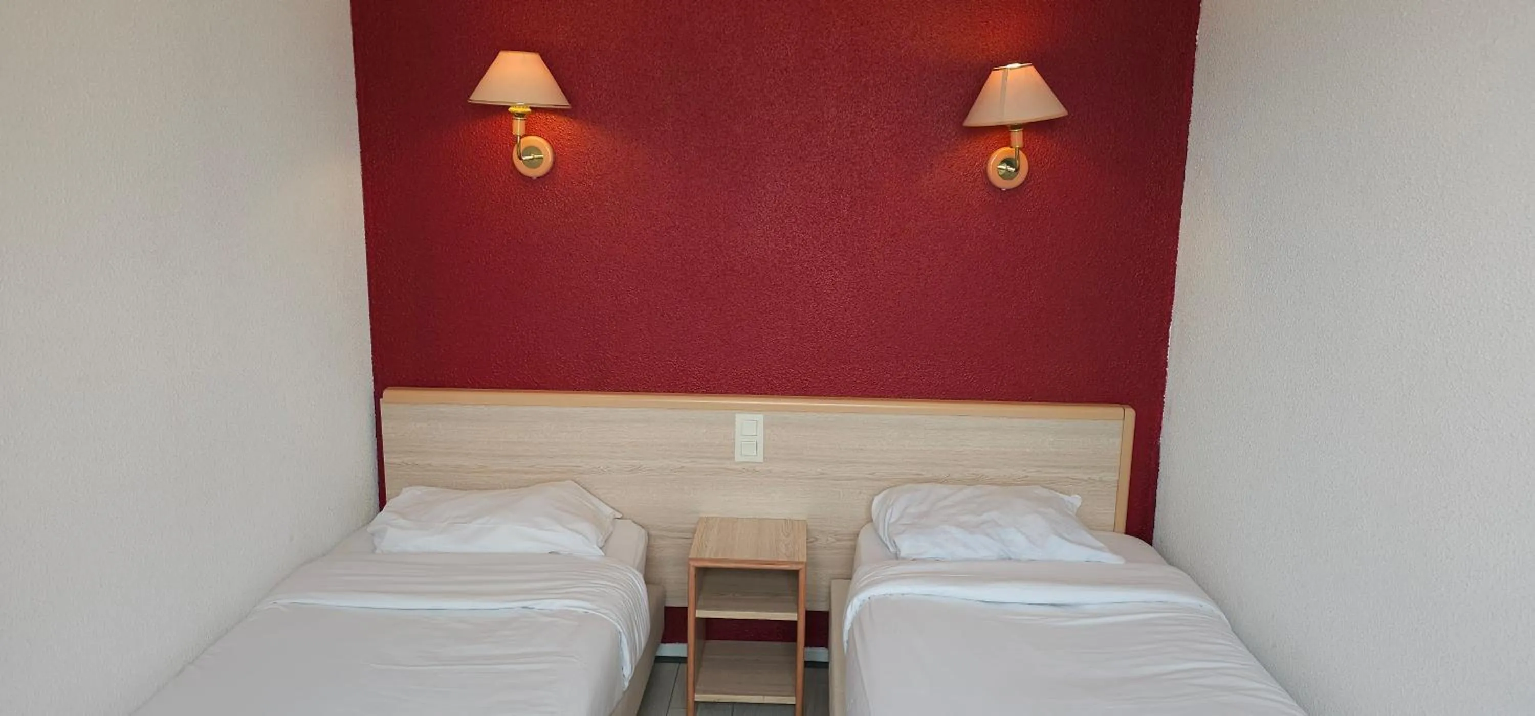 Bed in Hotel CÖRONA Lourdes