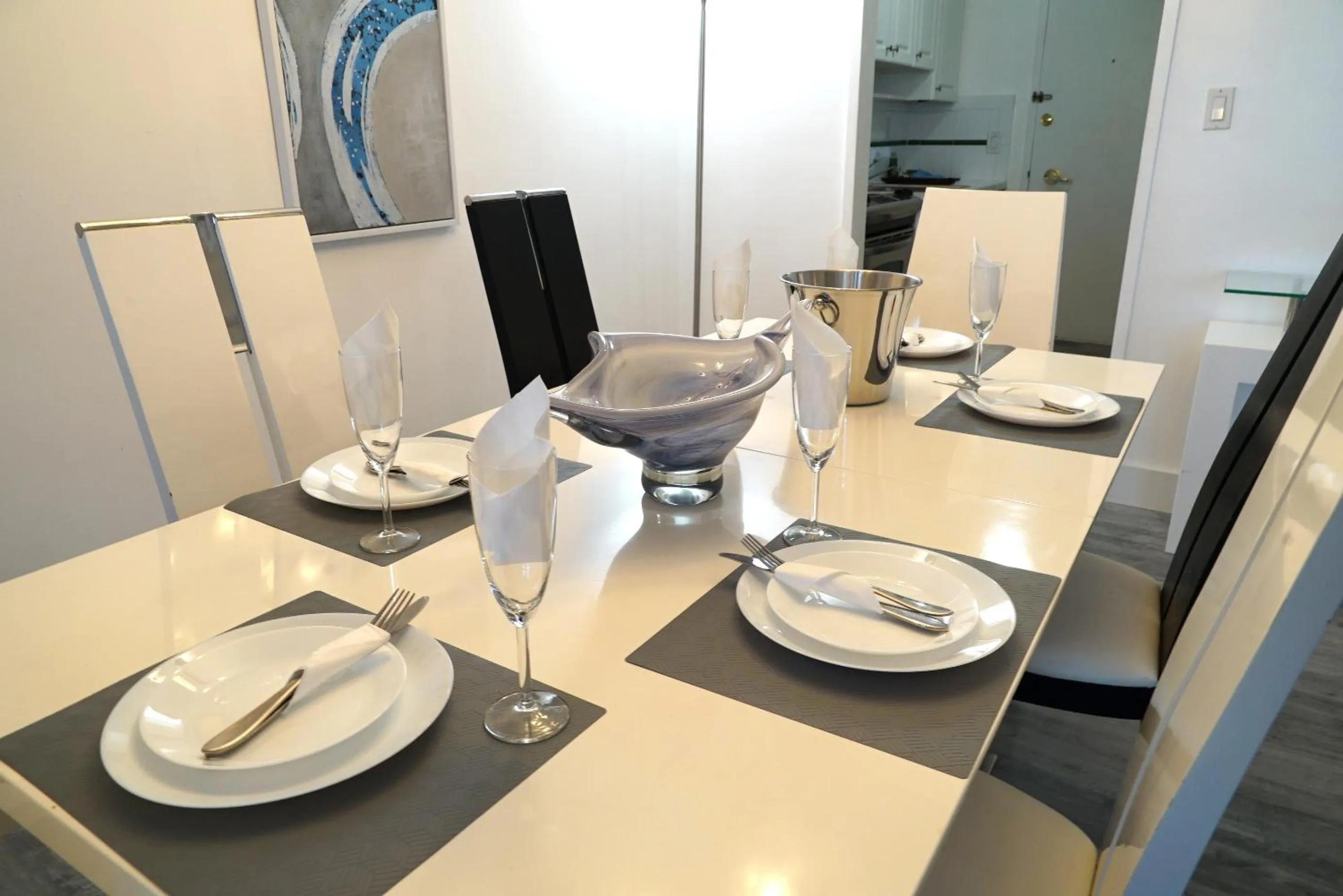 Dining area in Deluxe Apartments by South Florida Vacations