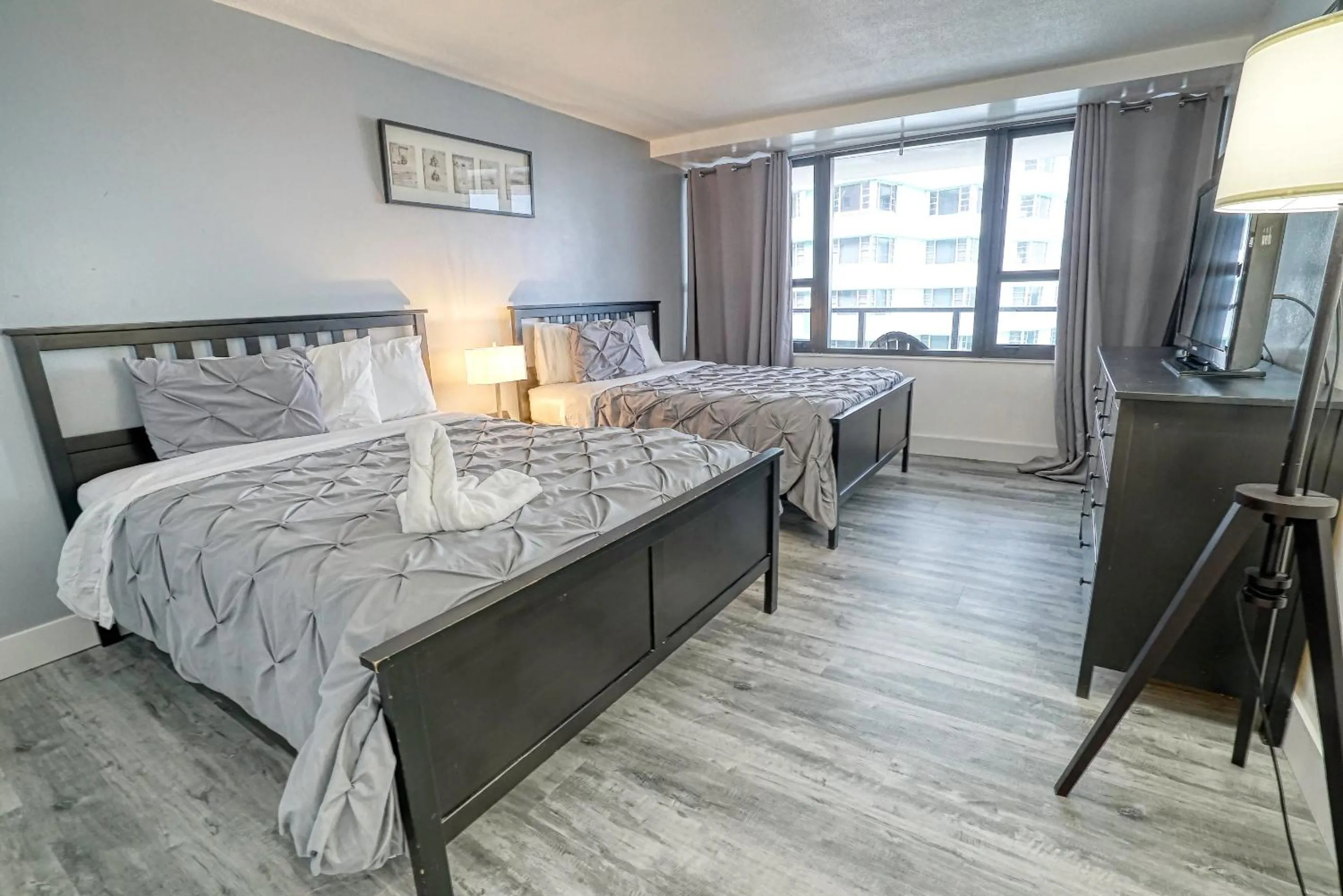 Bedroom, Bed in Deluxe Apartments by South Florida Vacations