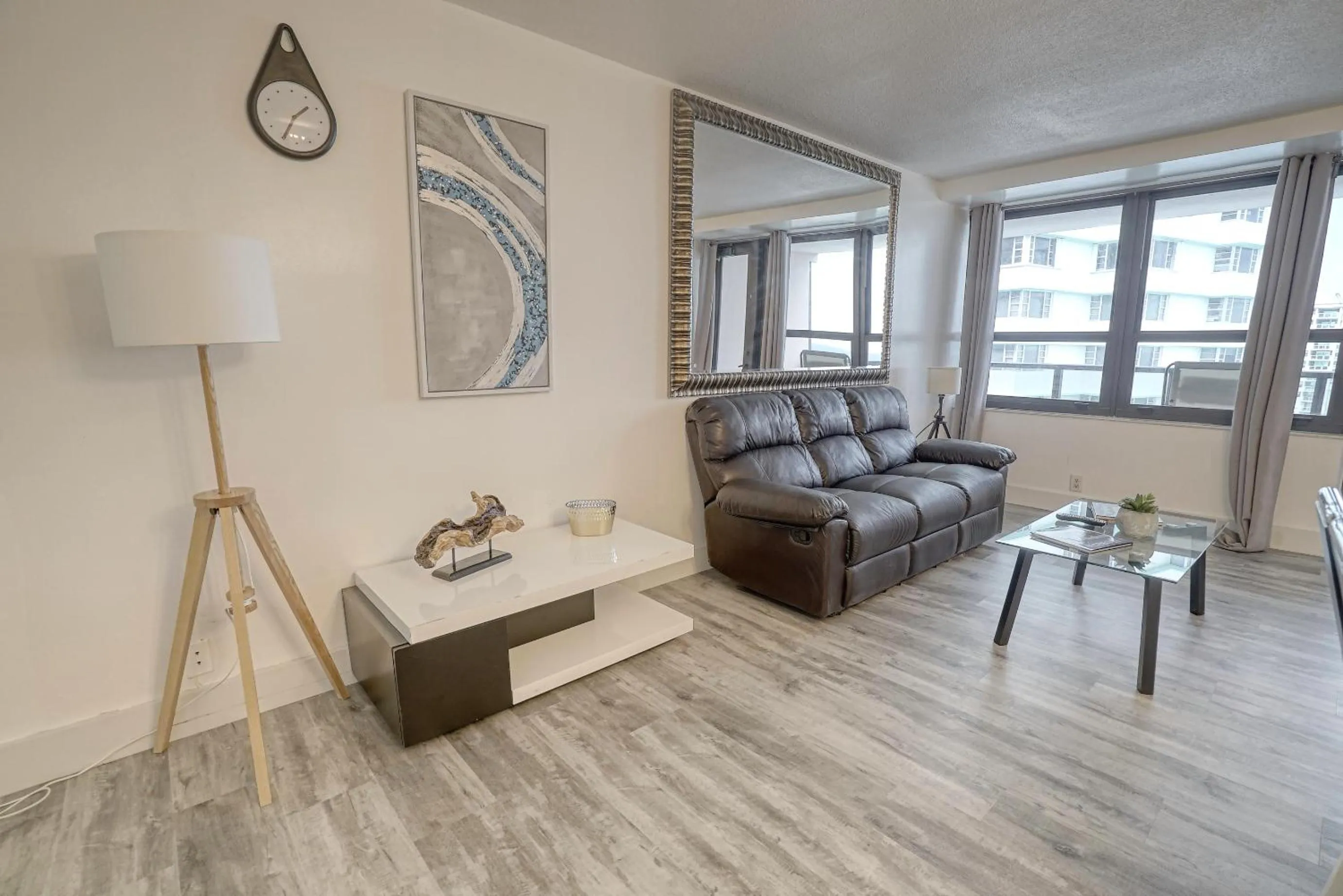 Living room in Deluxe Apartments by South Florida Vacations