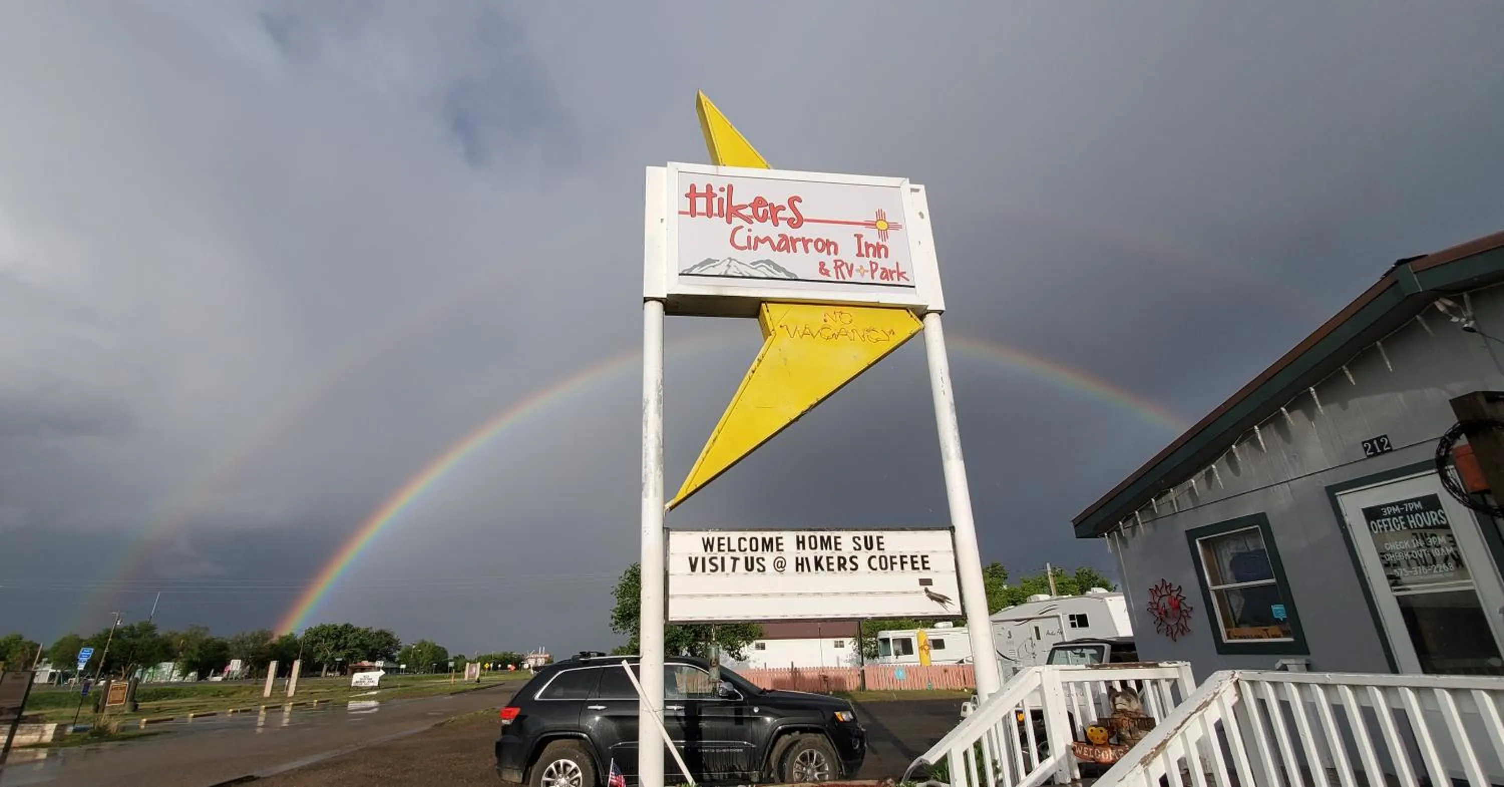 Property logo or sign in Hikers Cimarron Inn & RV Park