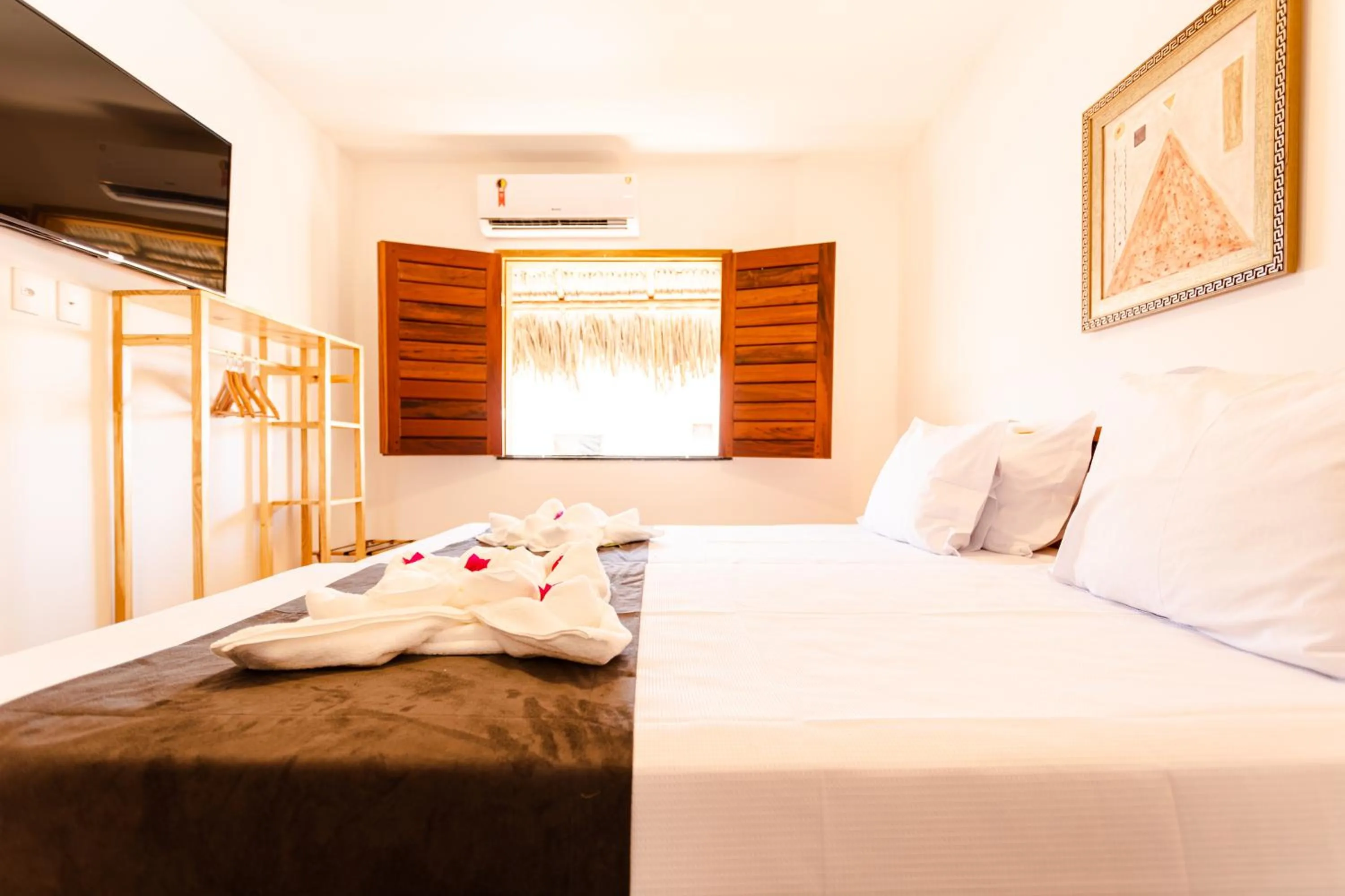 Photo of the whole room, Bed in UNKUÉ POUSADA FLATS