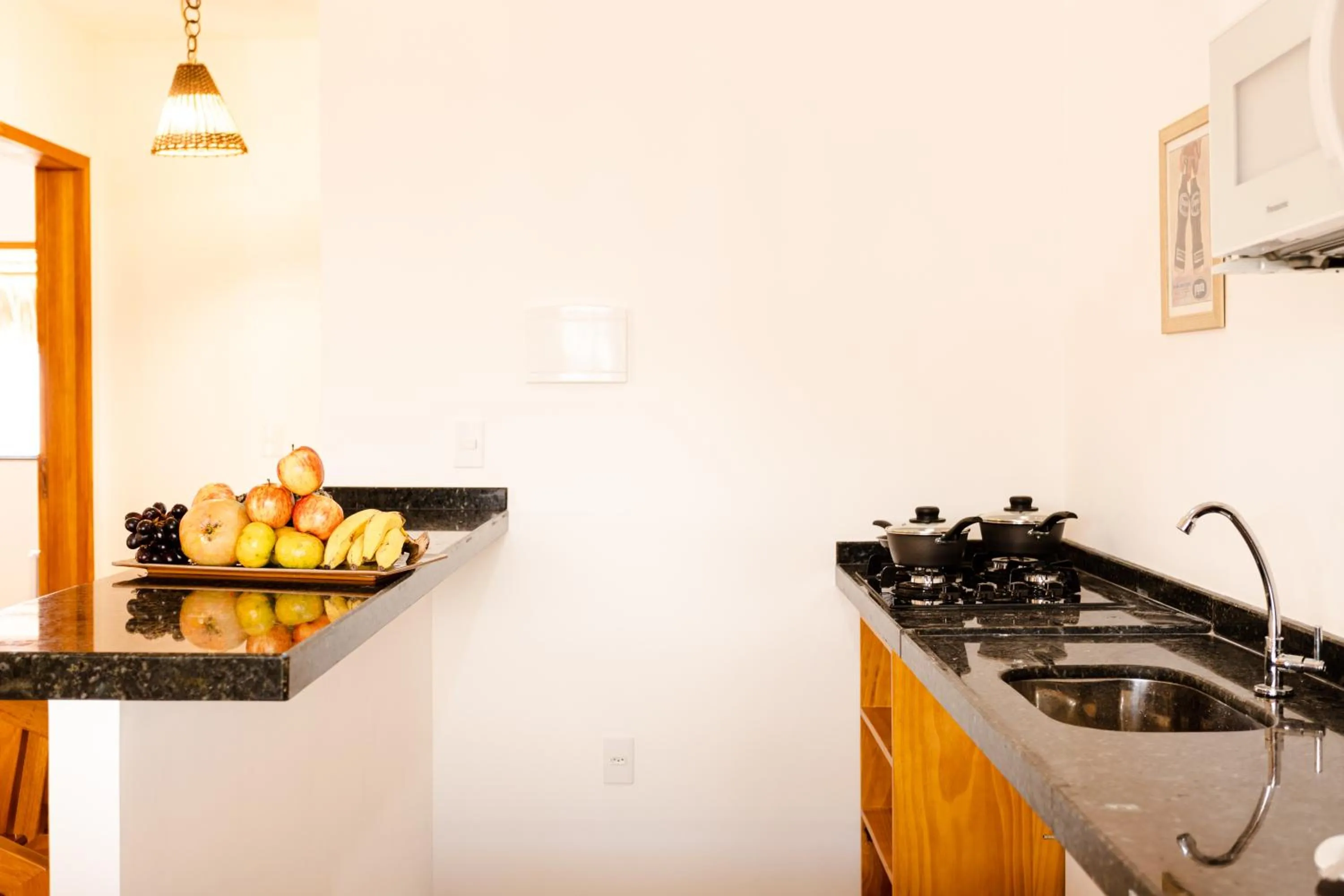 Kitchen or kitchenette in UNKUÉ POUSADA FLATS