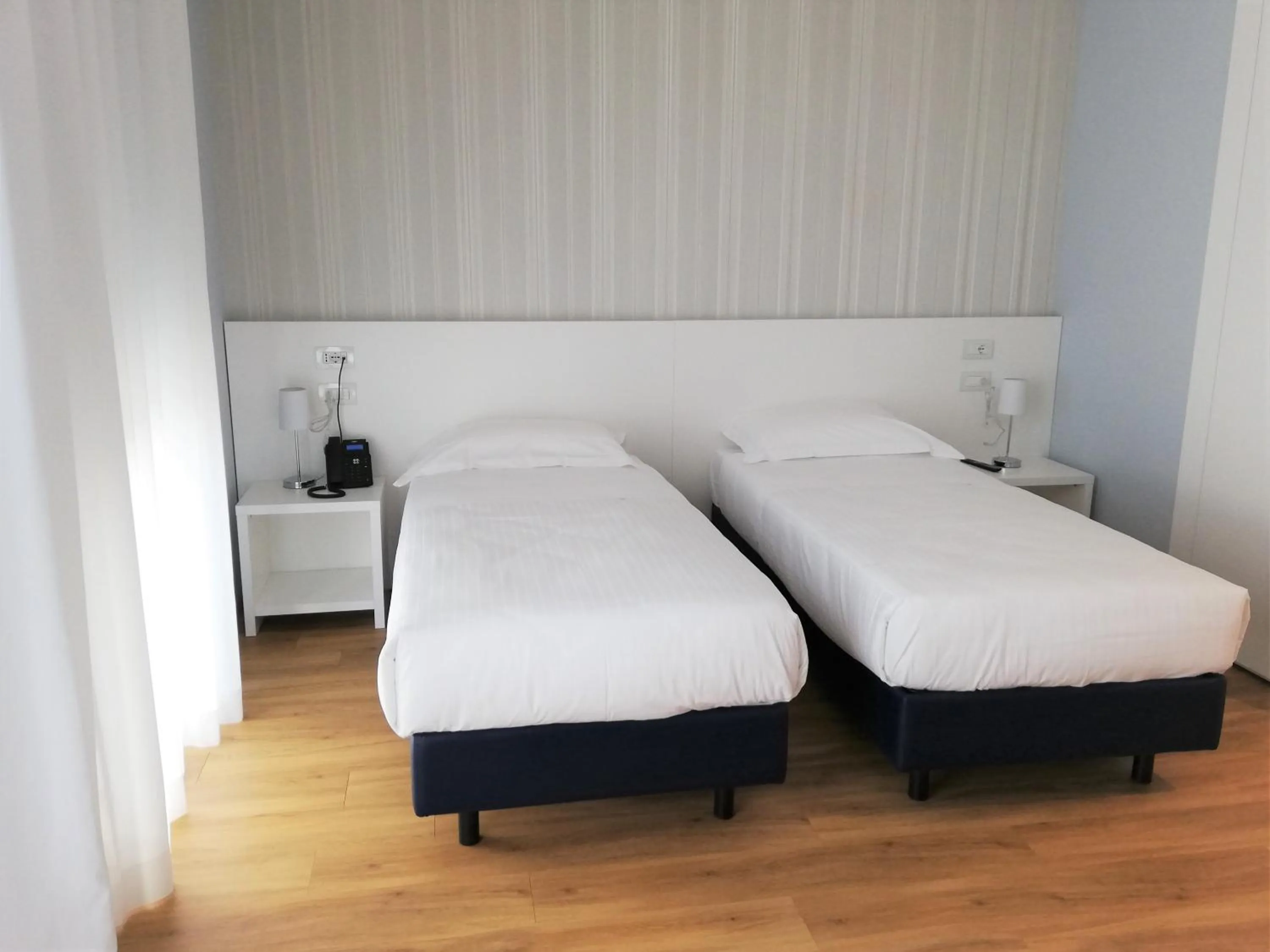 Bed in Novo Hotel Rossi