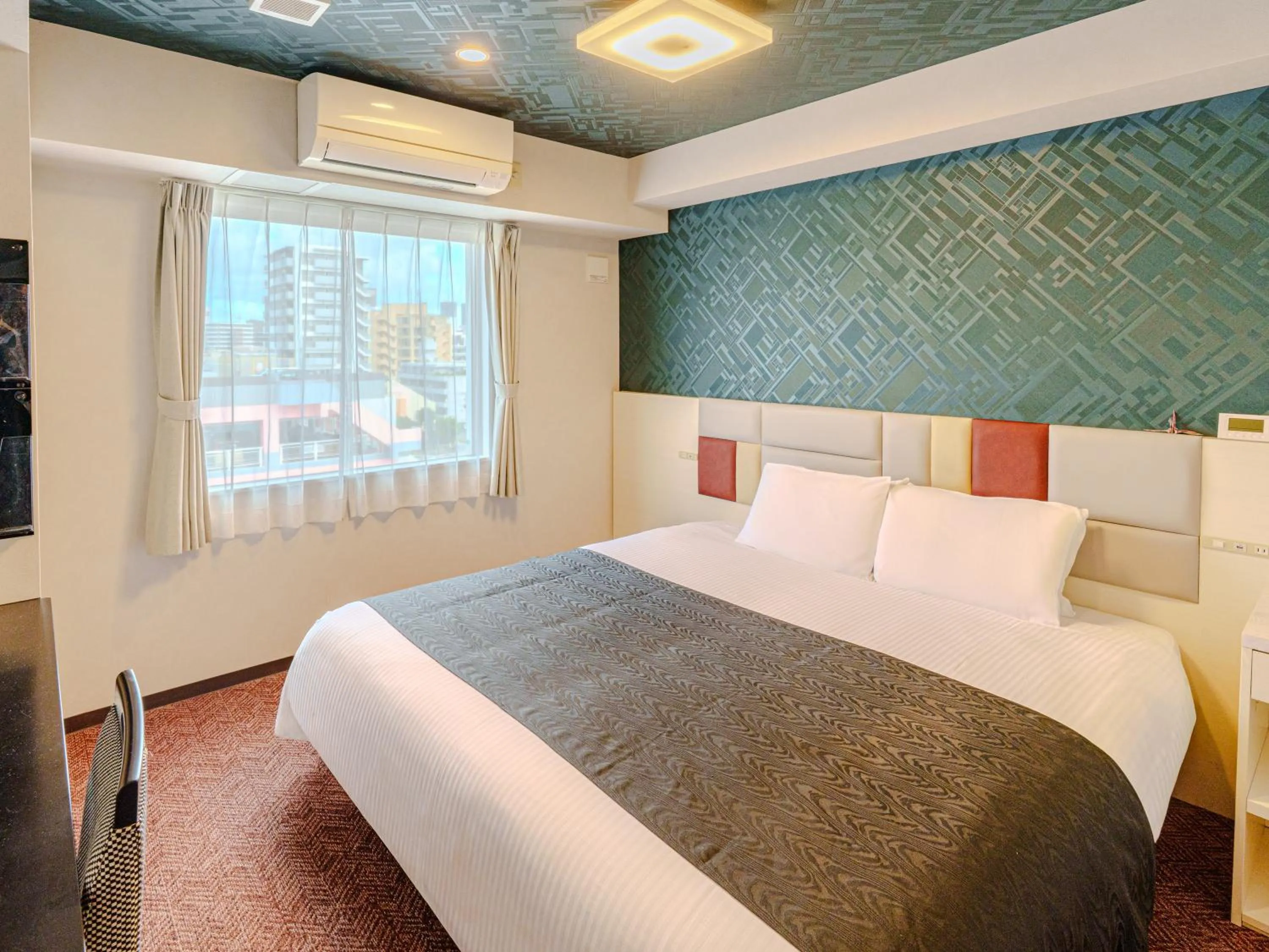 Photo of the whole room, Bed in APA Hotel Naha Airport Wakasa