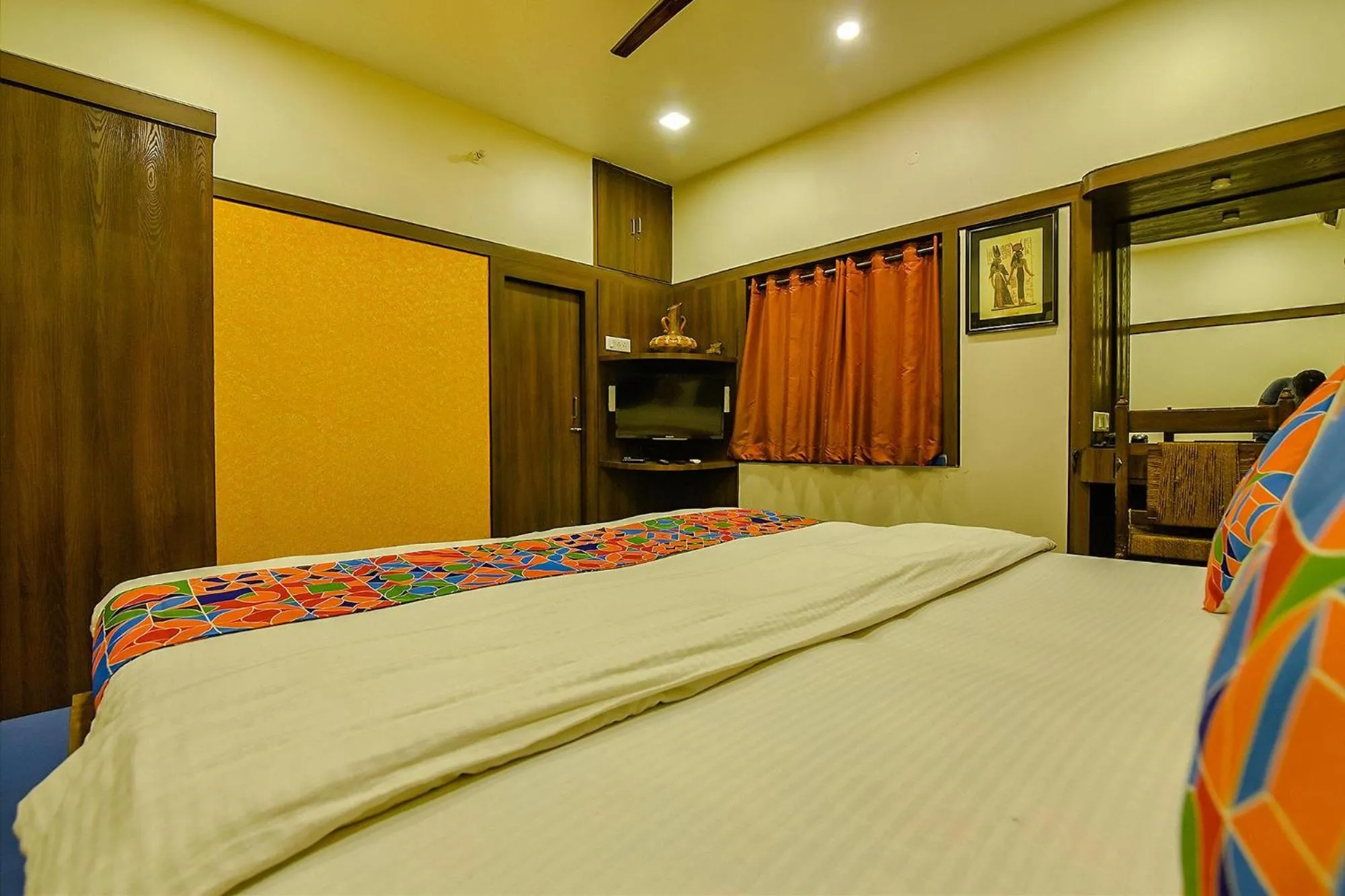 Bed in FabHotel Shivalya
