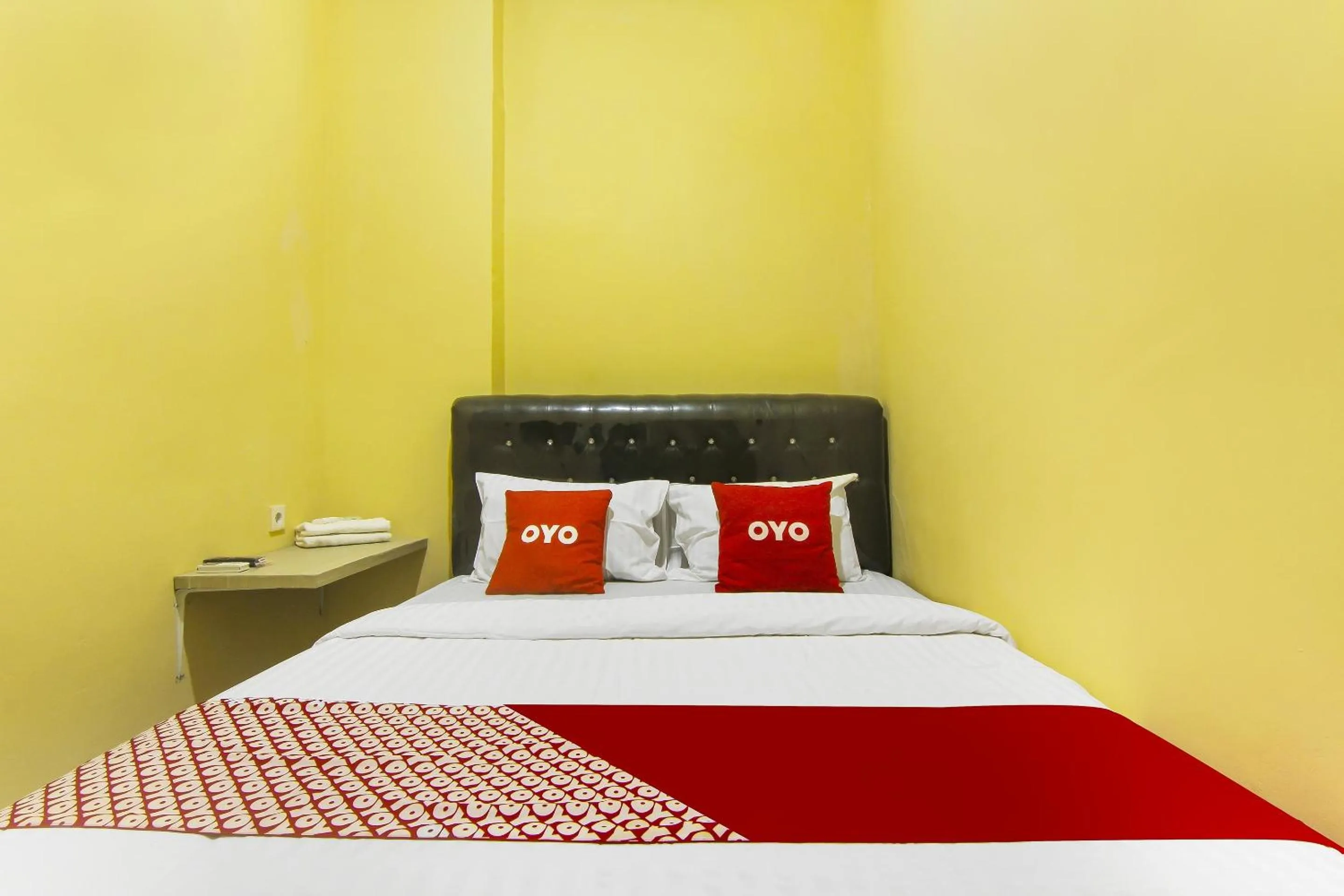 Bedroom in Hotel O Pagi Sore Residence