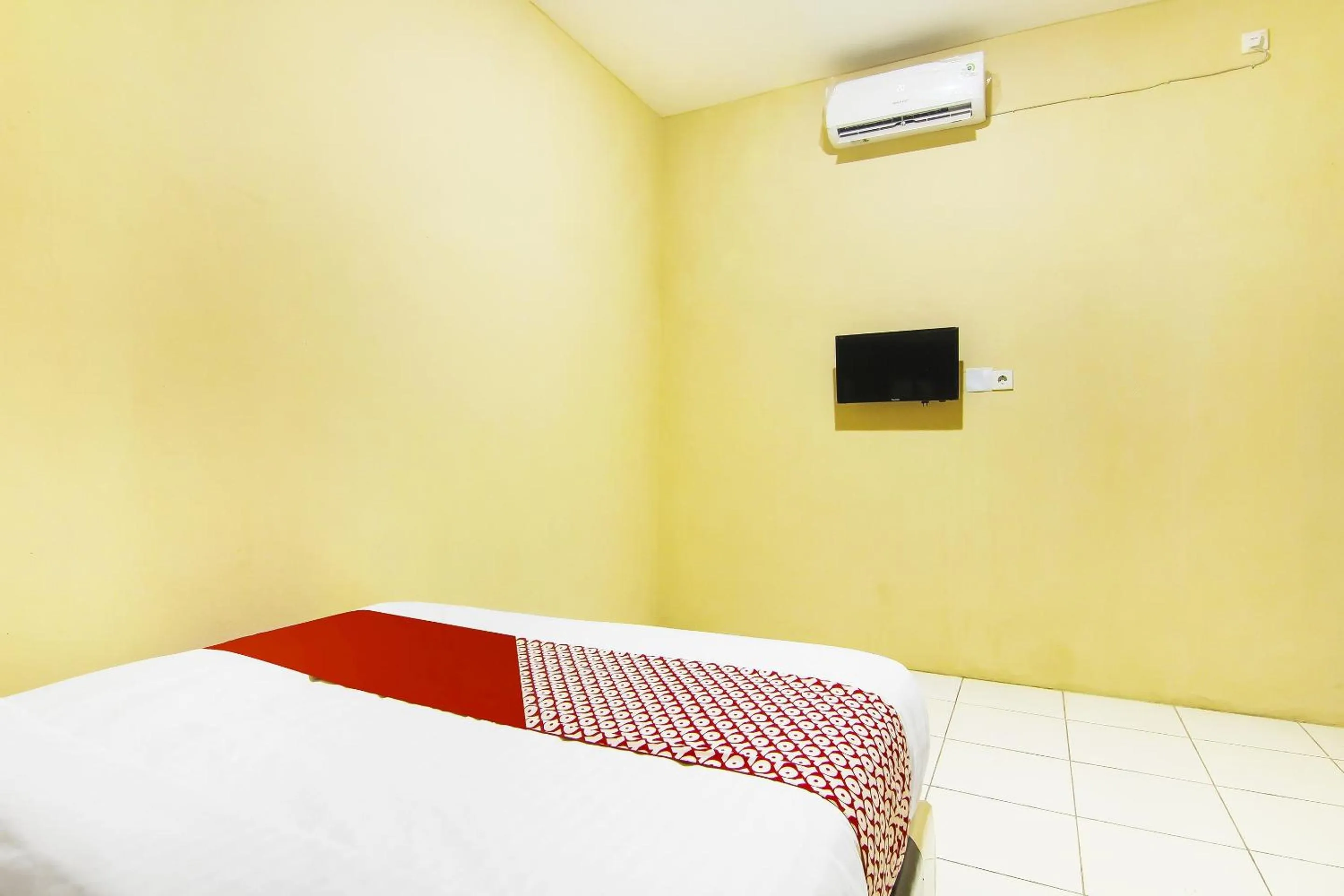 Bedroom in Hotel O Pagi Sore Residence