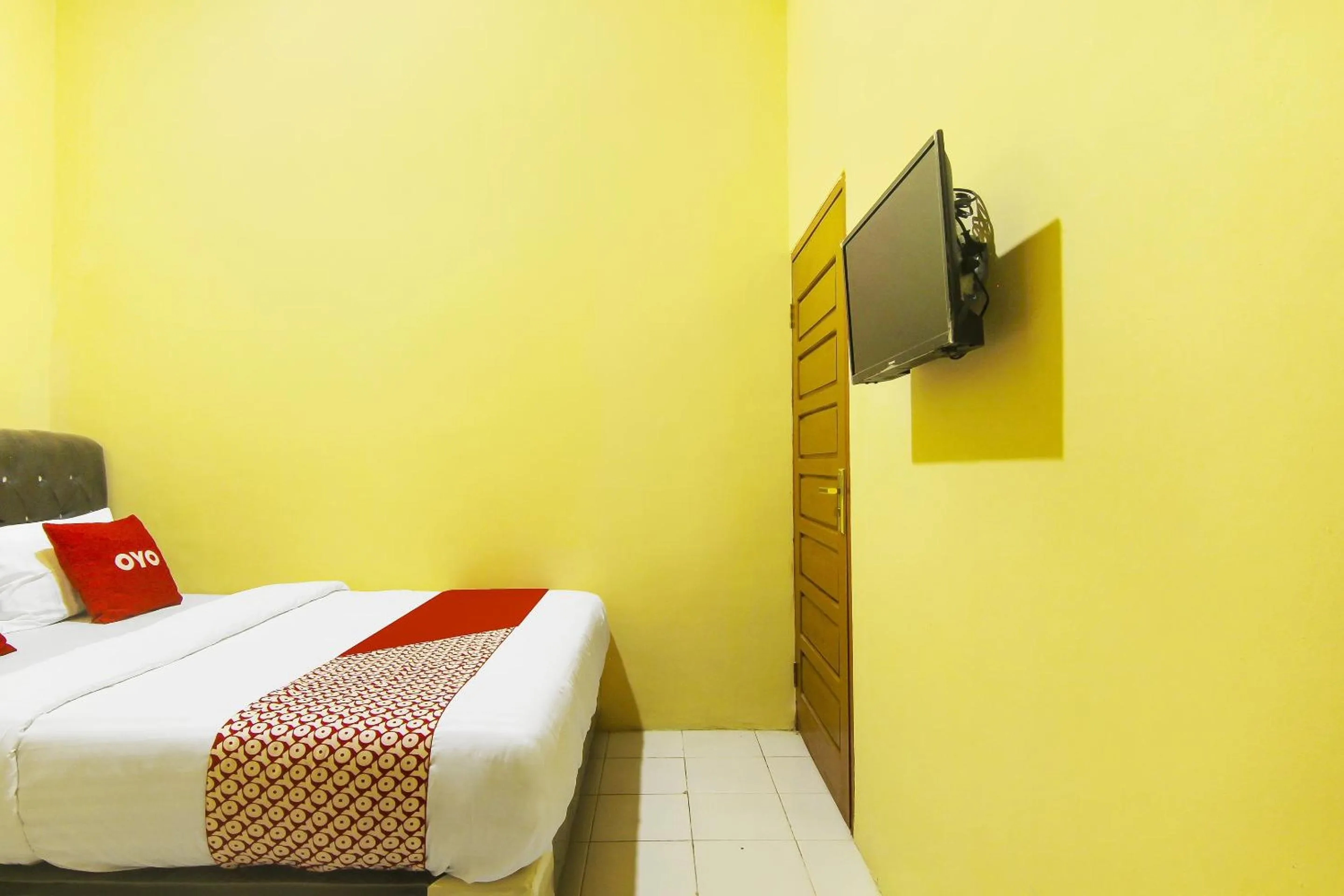 Bedroom in Hotel O Pagi Sore Residence