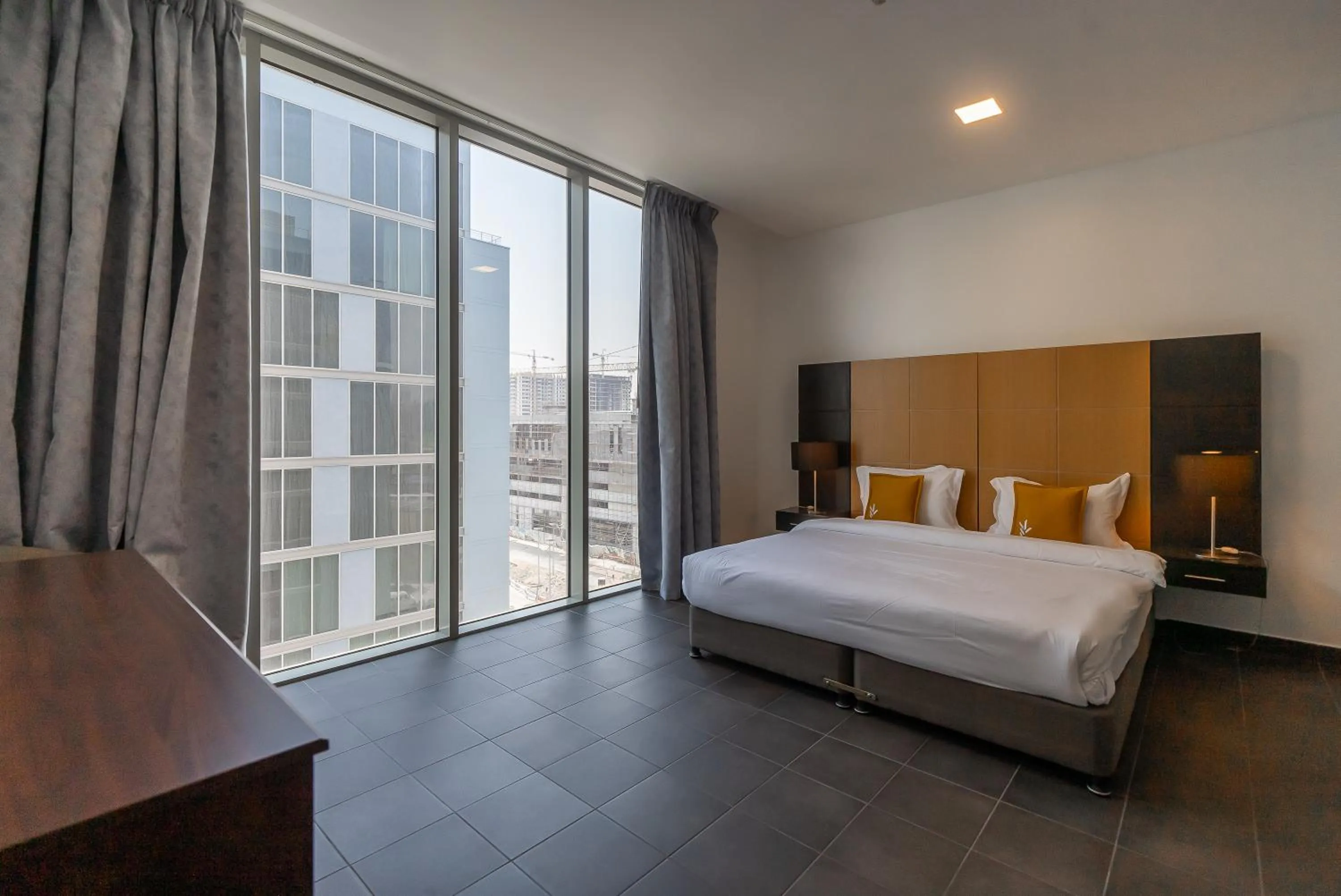 Bedroom, Bed in Emirates Sports Hotel, Dubai Sports City