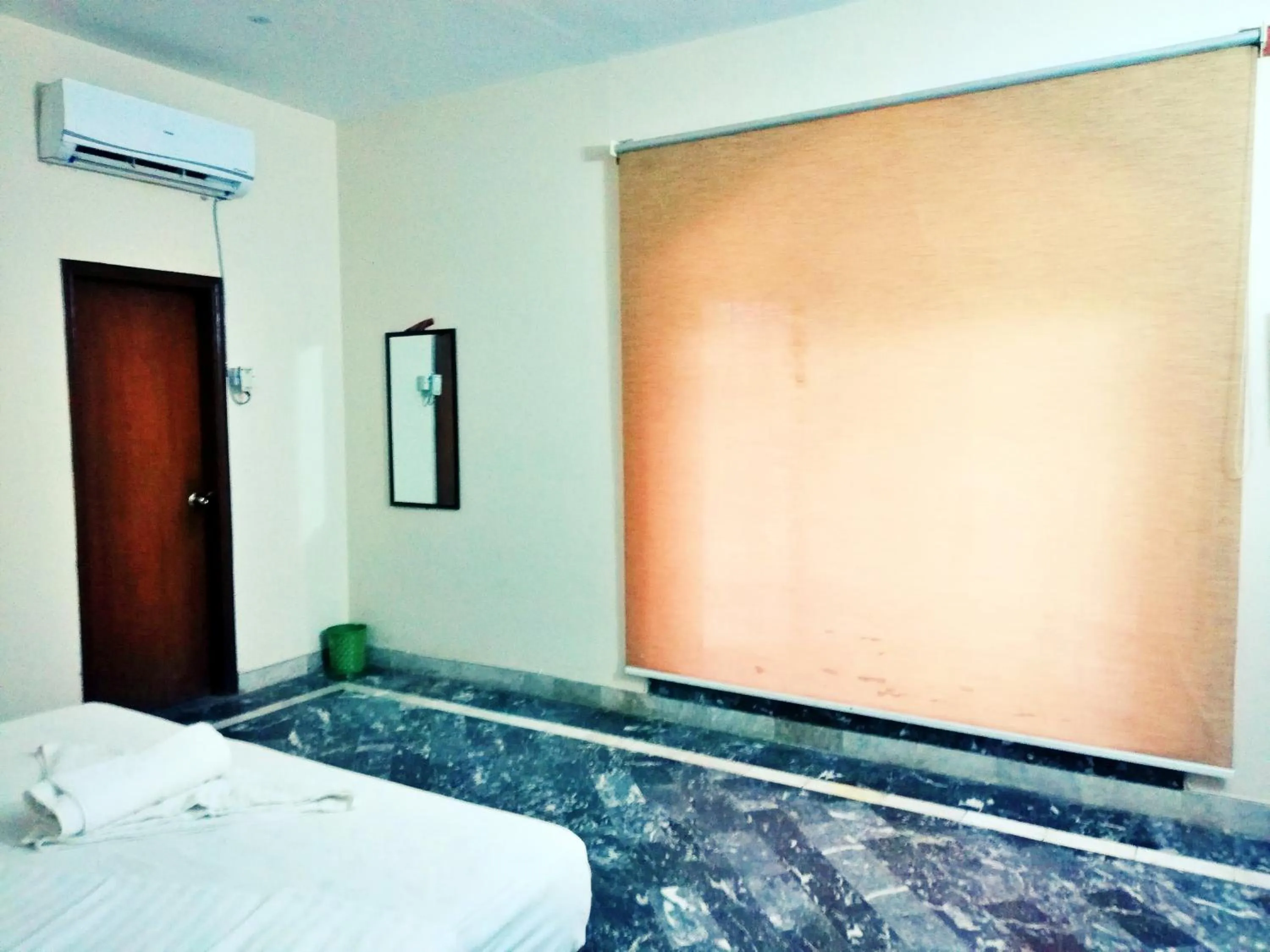 Bedroom in Hotel Rose Inn Lahore