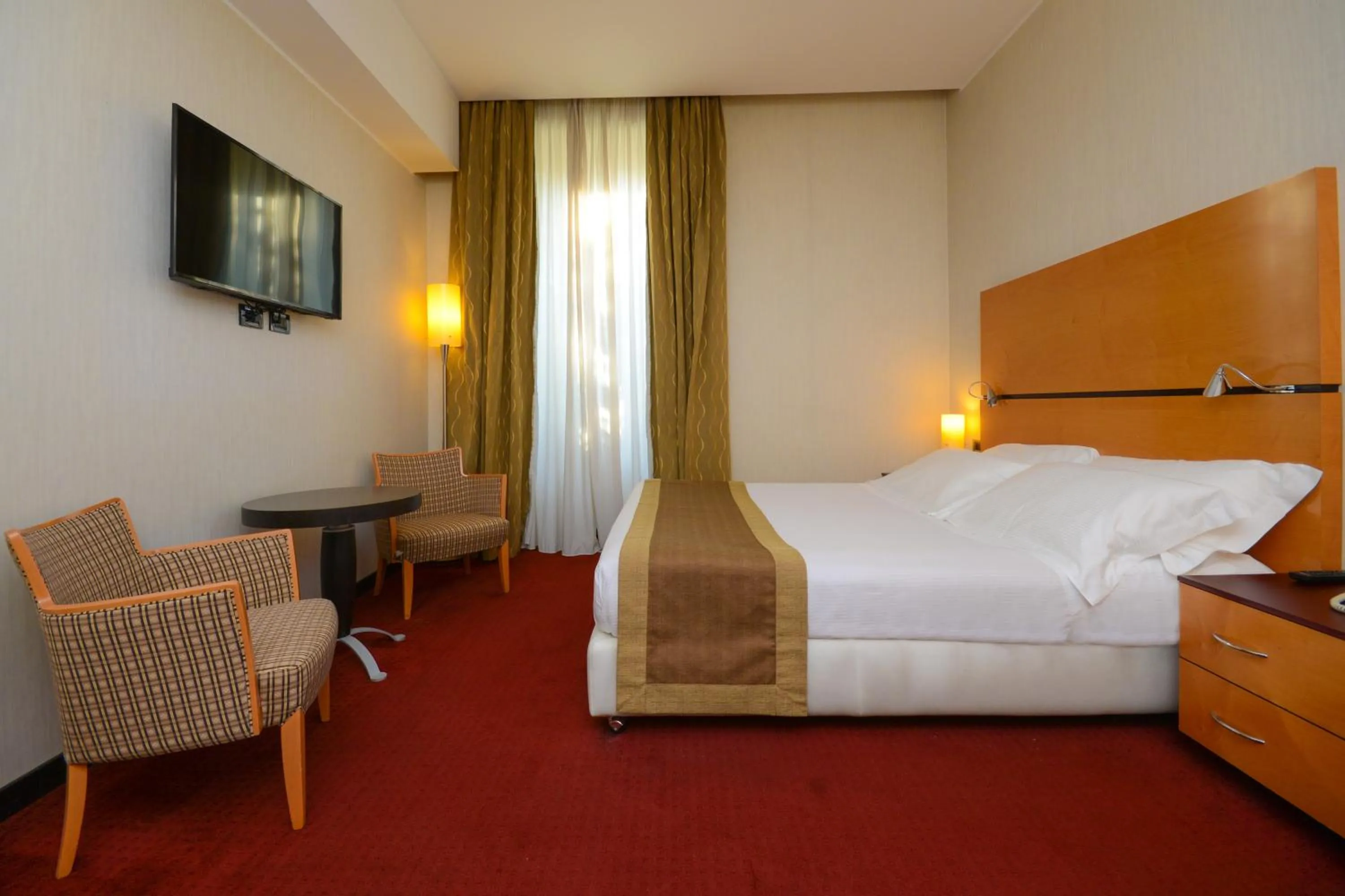 Seating area, Bed in Hotel Igea