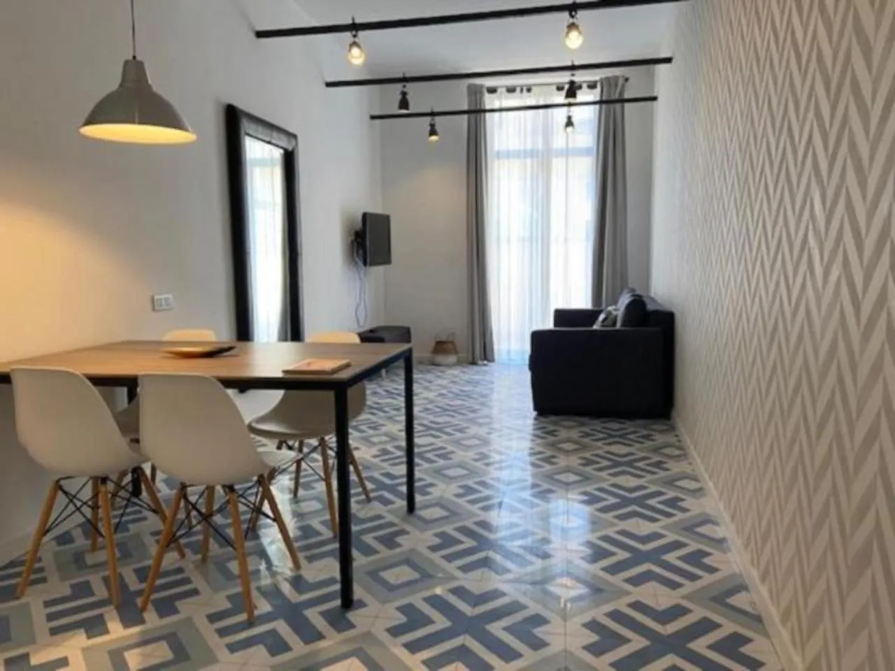 Living room in Liceu Apartments by gaiarooms