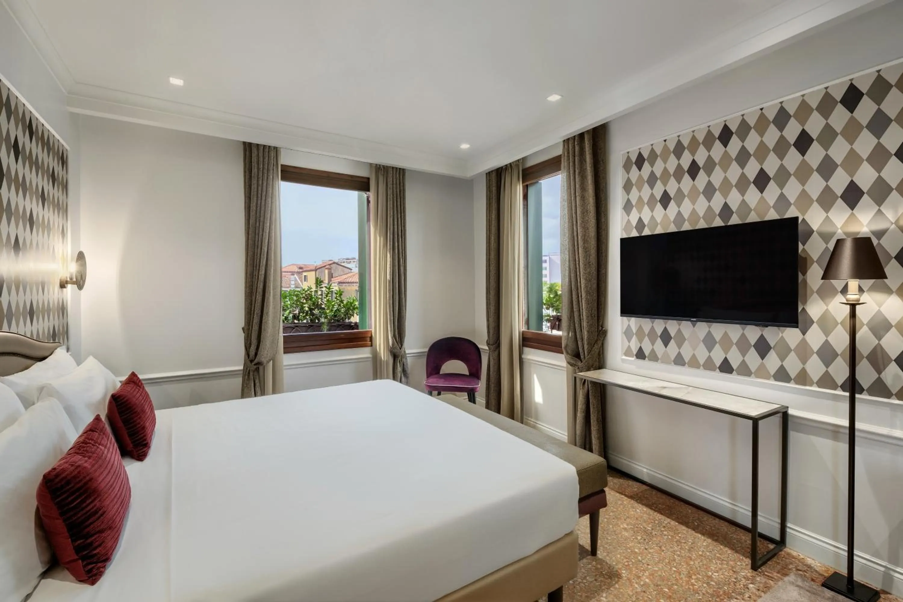 Bed in Hotel Arlecchino