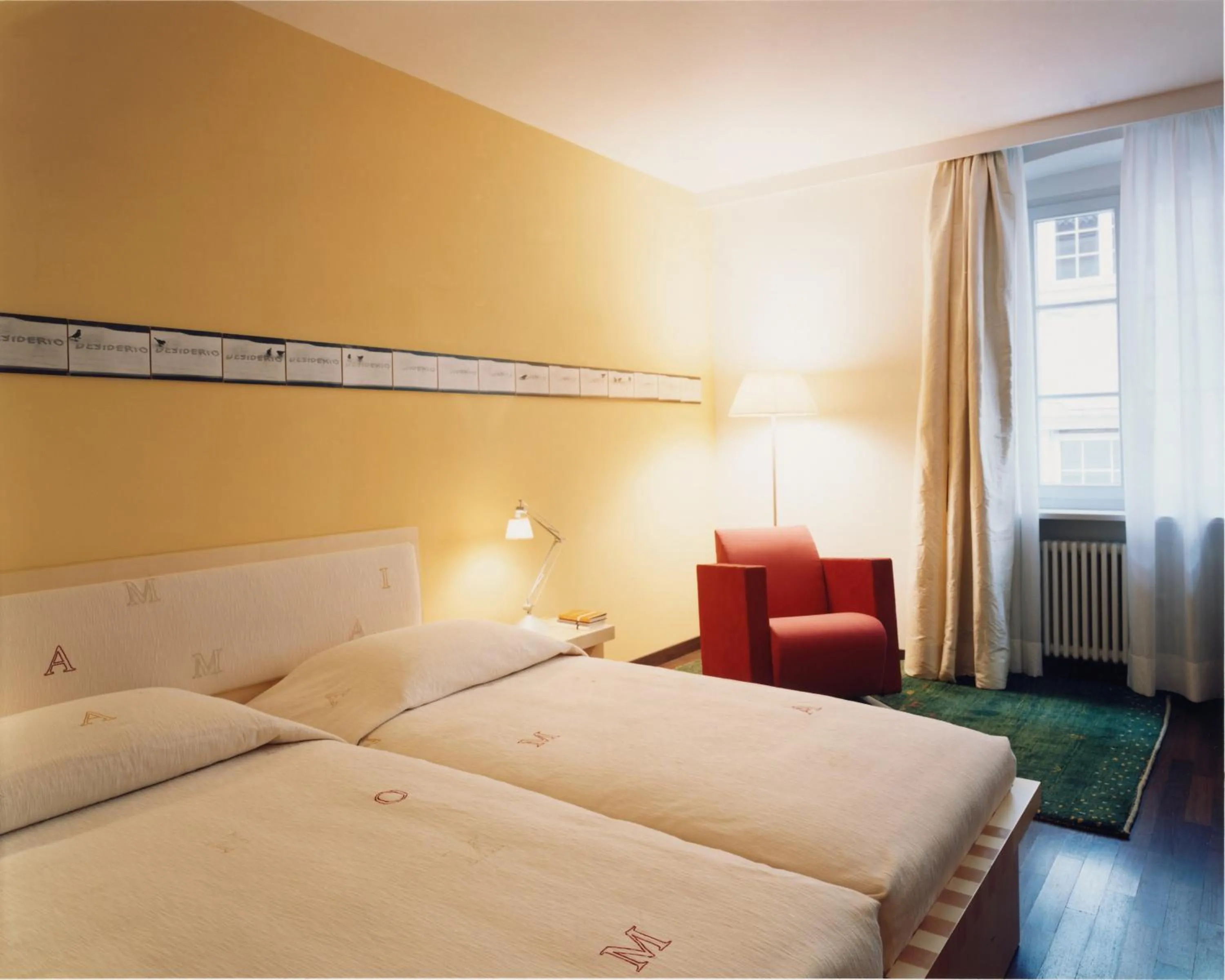 Bed in Hotel Greif, a Member of Design Hotels