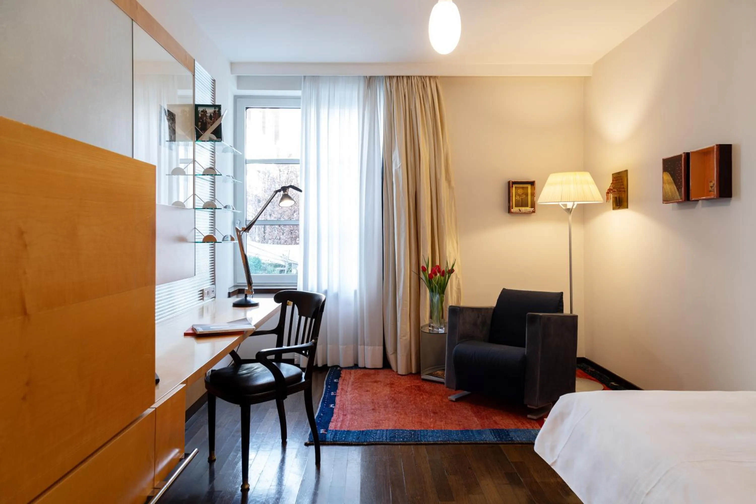 Seating area, Bed in Hotel Greif, a Member of Design Hotels