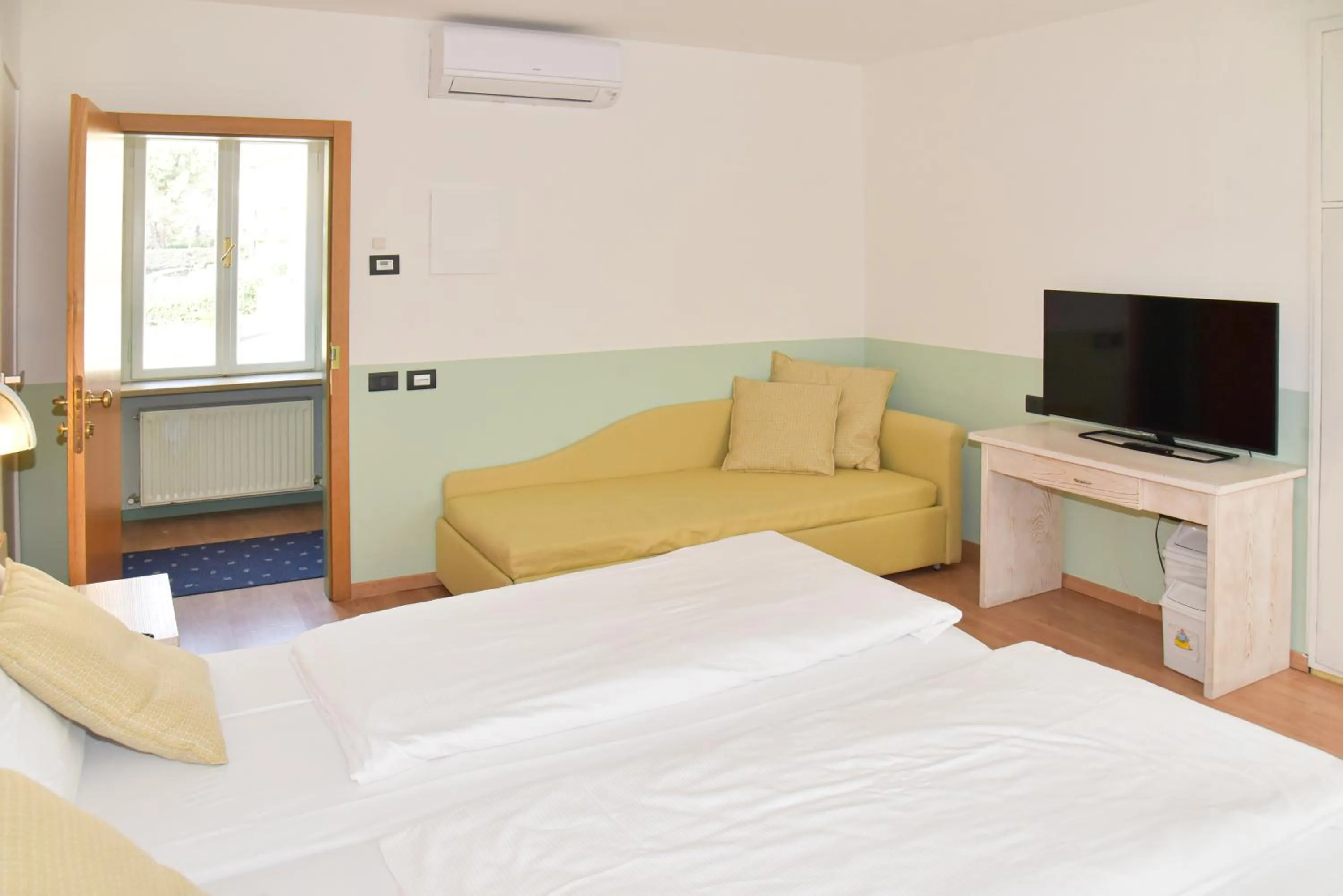 Bed in epOche Hotel Zanella 1889