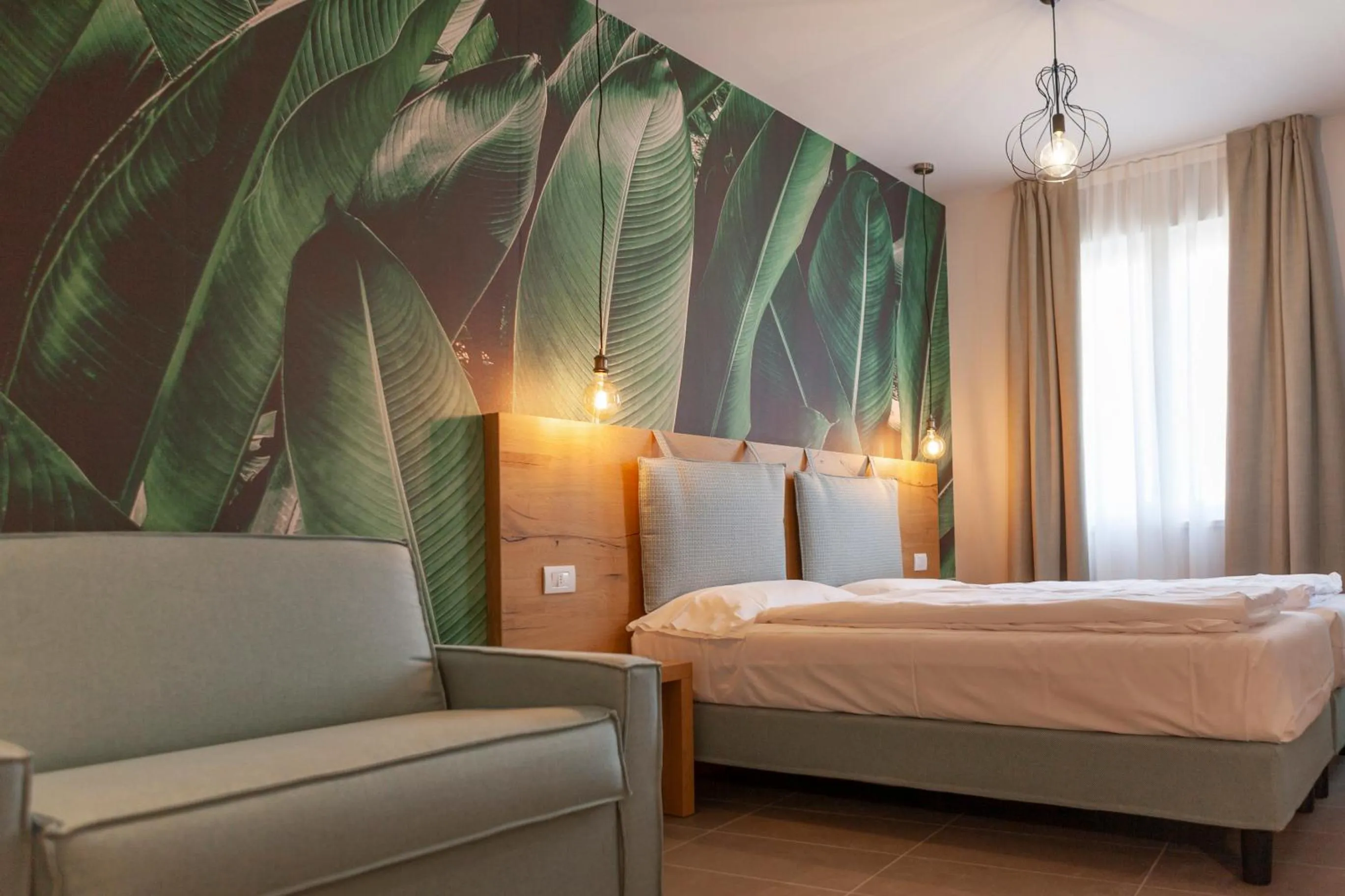 Bed in epOche Hotel Zanella 1889