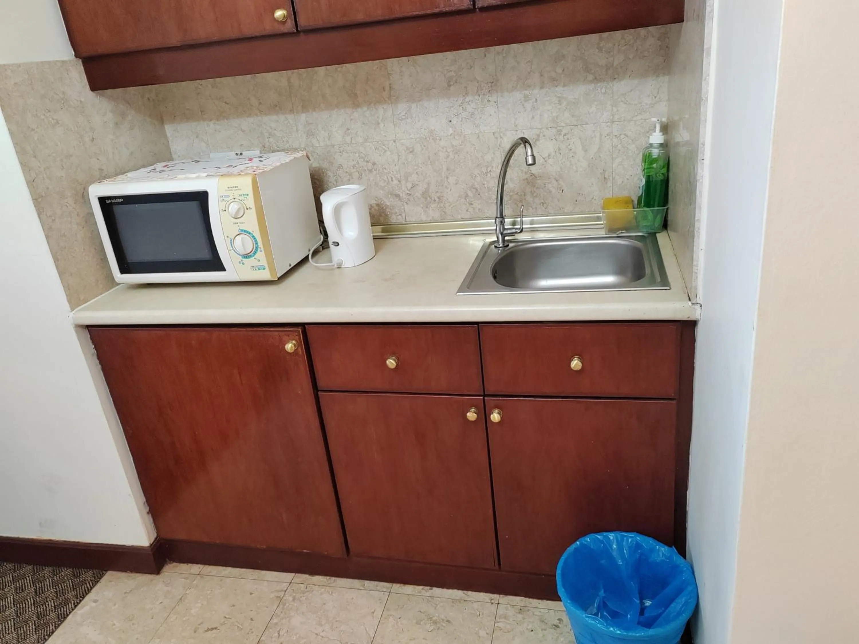 Kitchen or kitchenette in Kl landmark apartment at berjay Times square