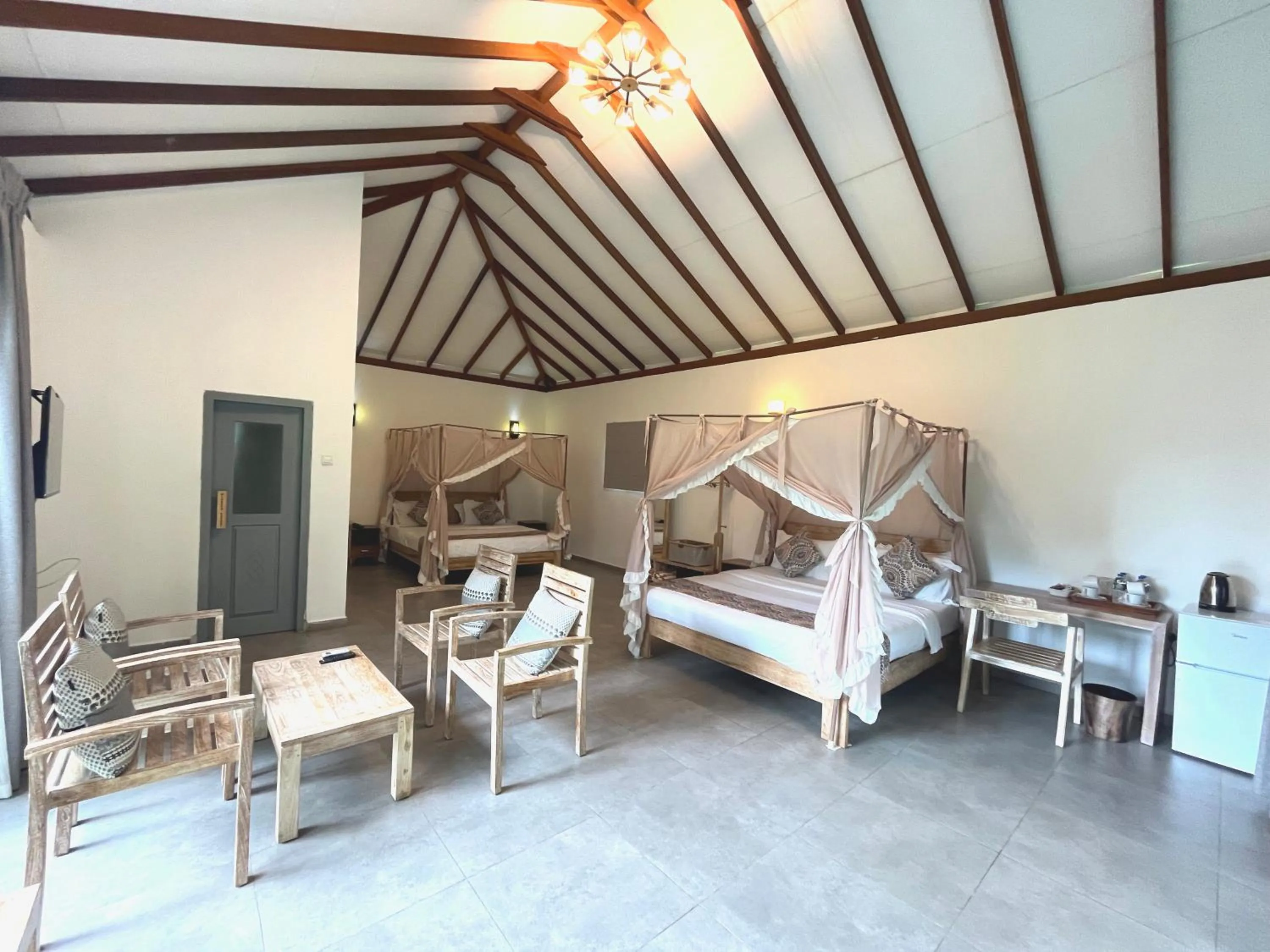 Bed in NIVADOO RESORT SIGIRIYA