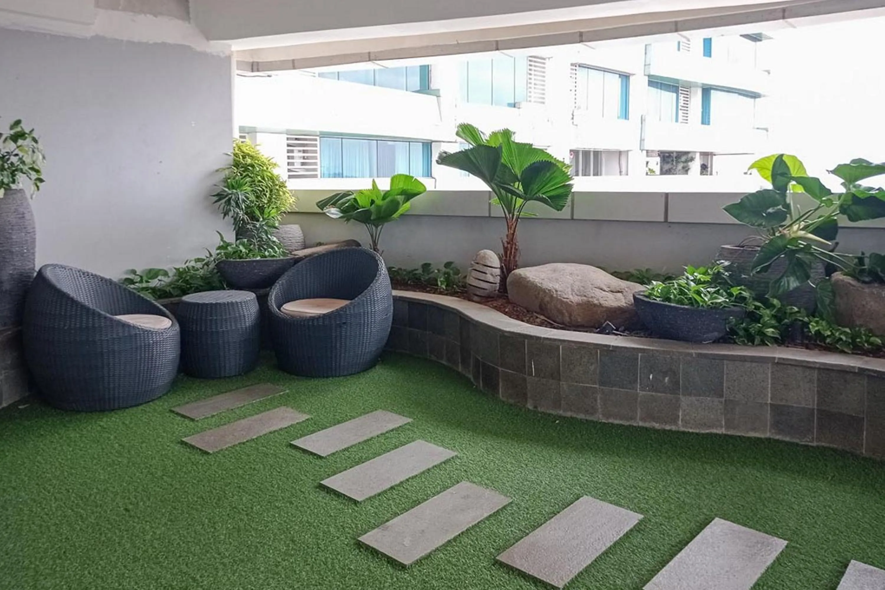 Garden in RedLiving Apartemen Grand Kamala Lagoon - Pekayon Tower Barclay North