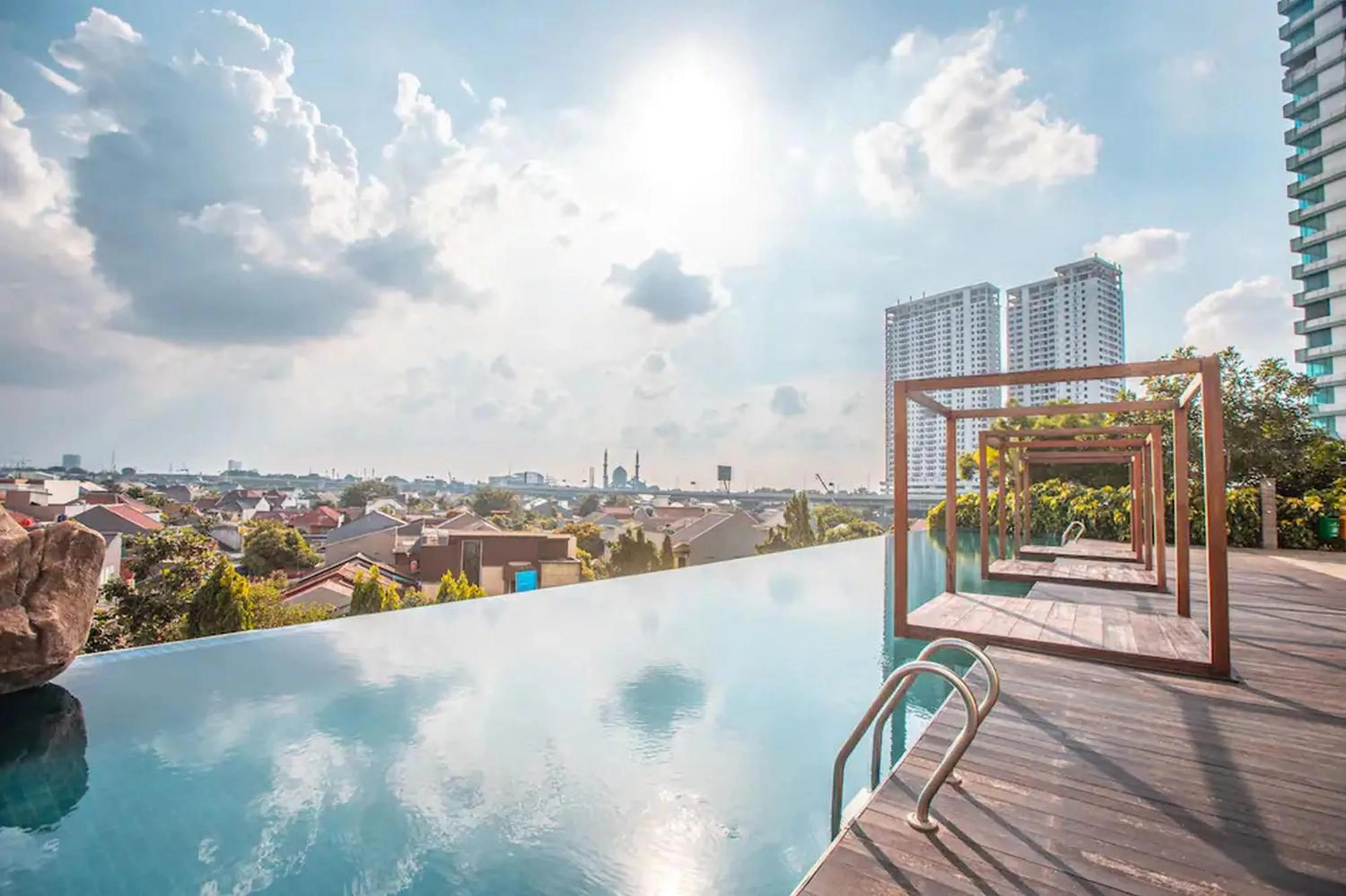 Swimming pool in RedLiving Apartemen Grand Kamala Lagoon - Pekayon Tower Barclay North