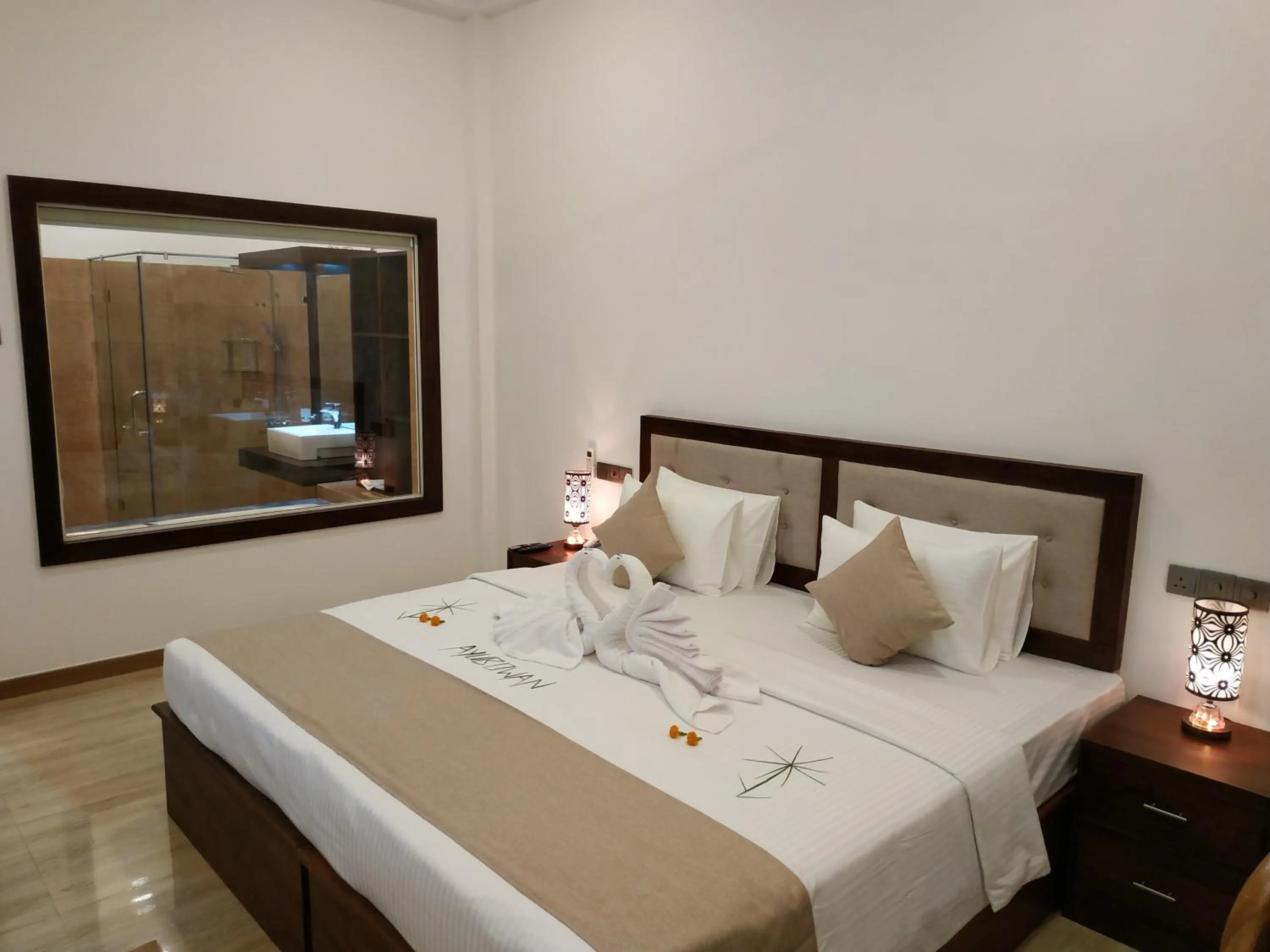 Bed in Sigiriya Cashew Palace Resort