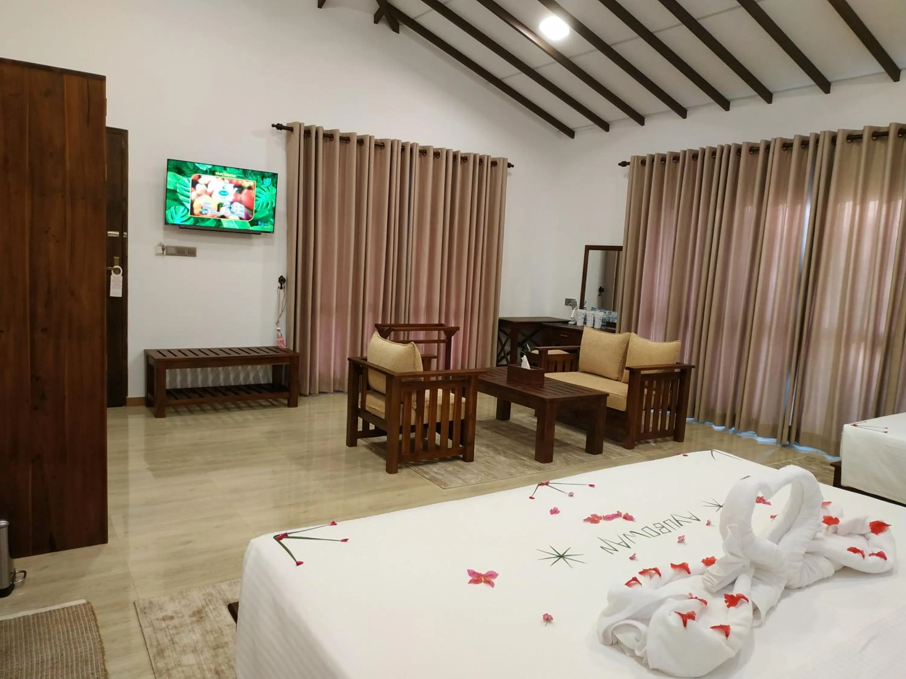 Bed in Sigiriya Cashew Palace Resort