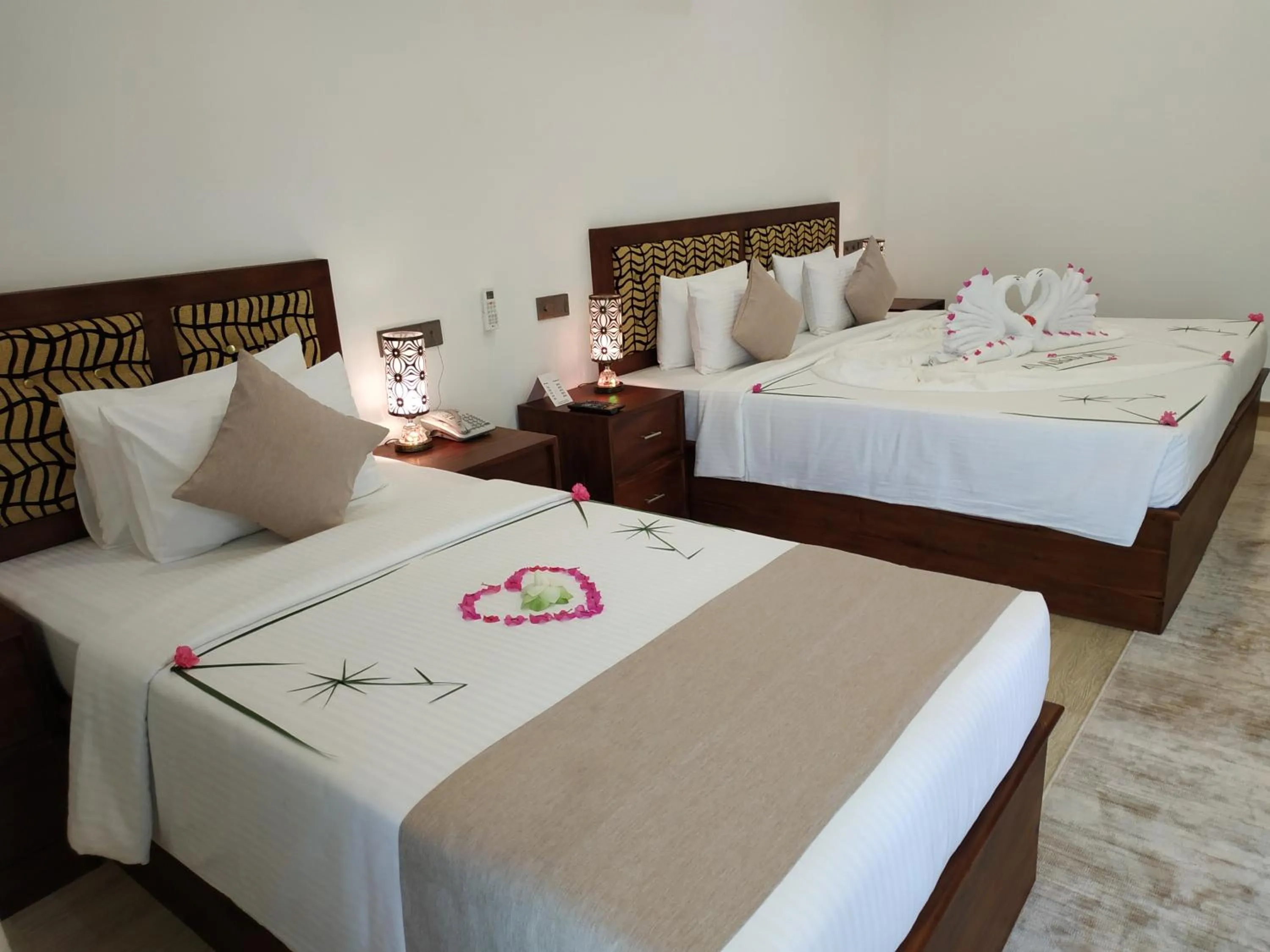 Bed in Sigiriya Cashew Palace Resort