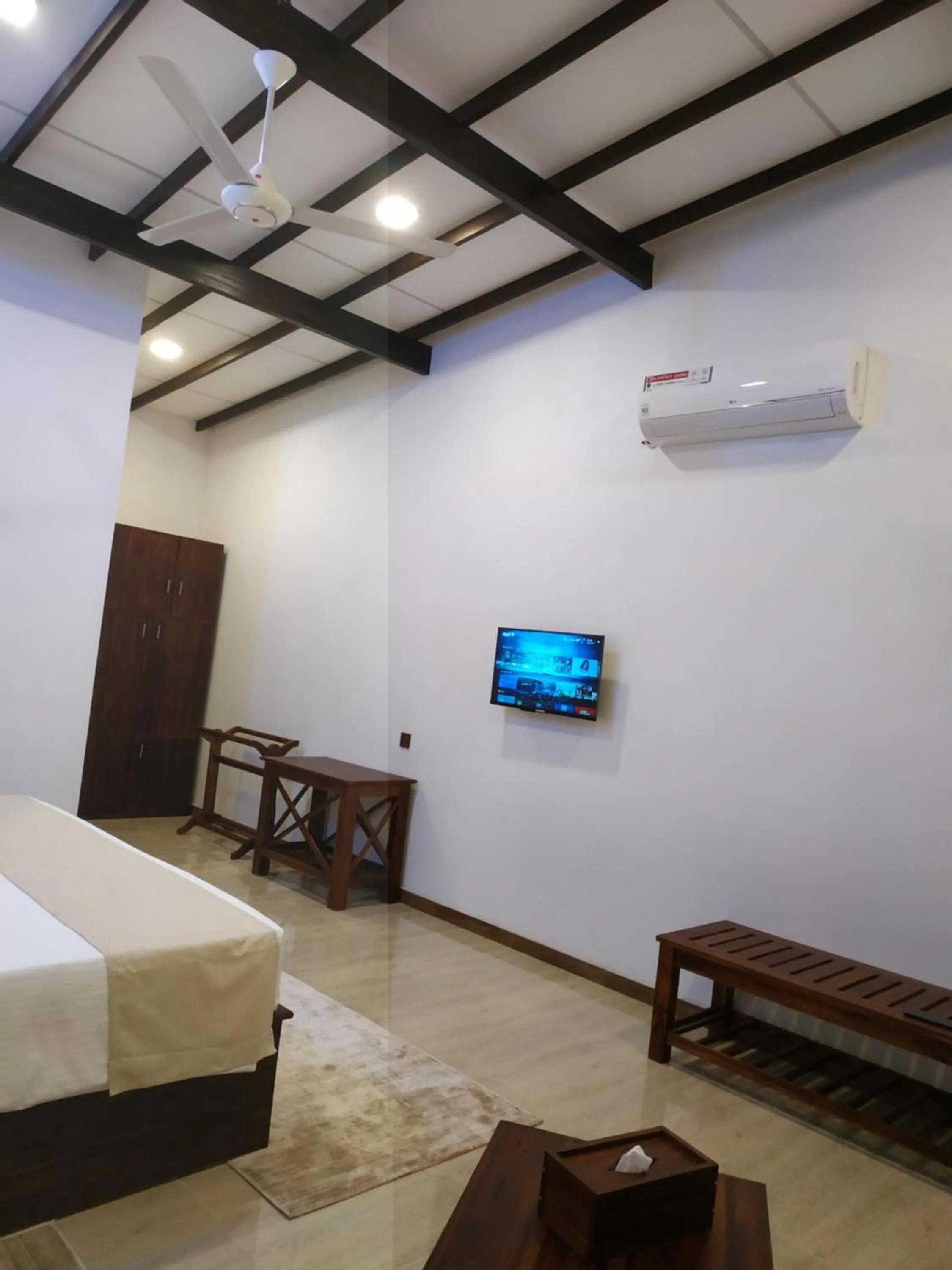 Bed in Sigiriya Cashew Palace Resort