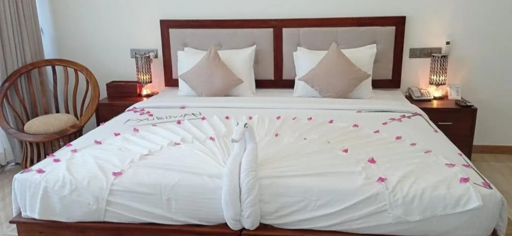 Bed in Sigiriya Cashew Palace Resort