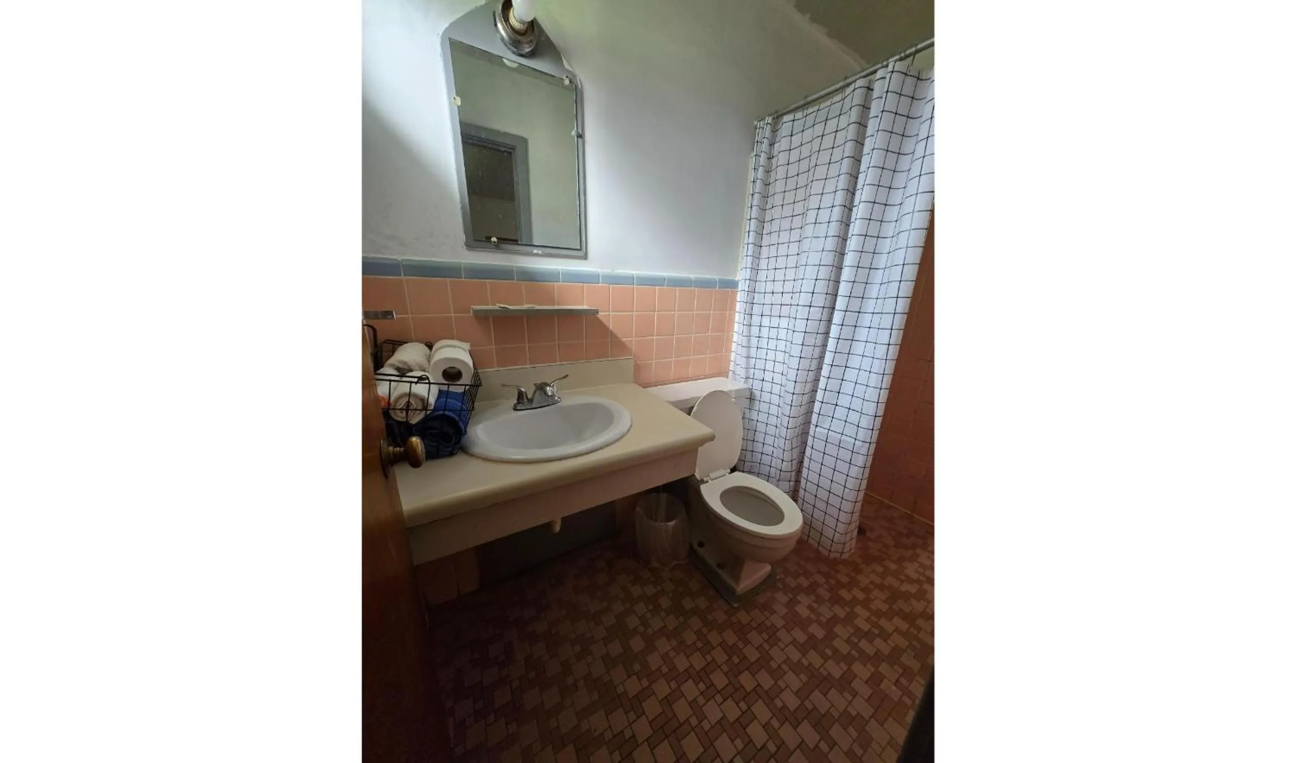 Bathroom in OYO Sandman Inn