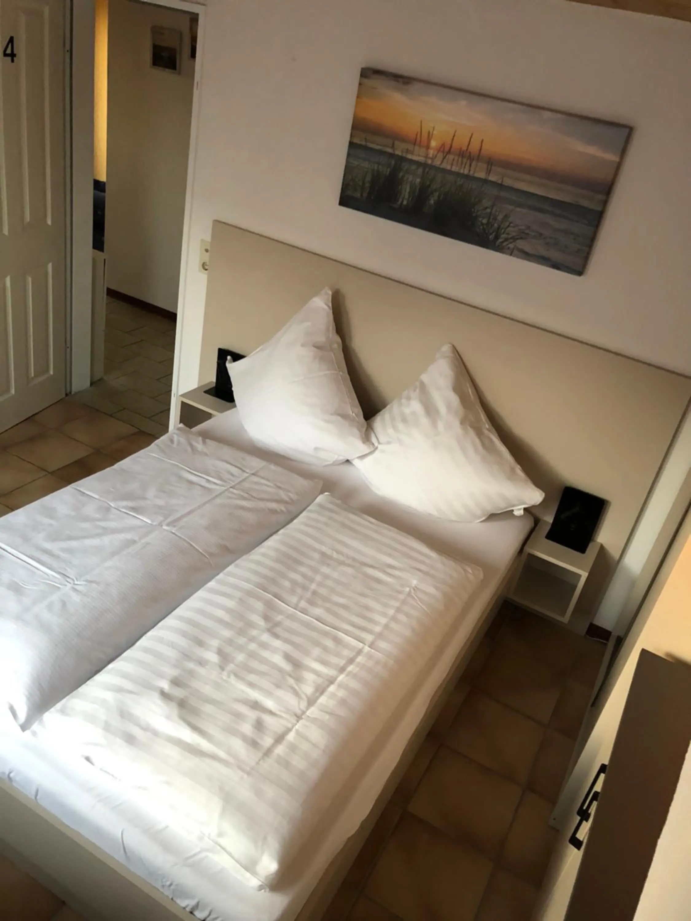 Bed in pension-seegarten