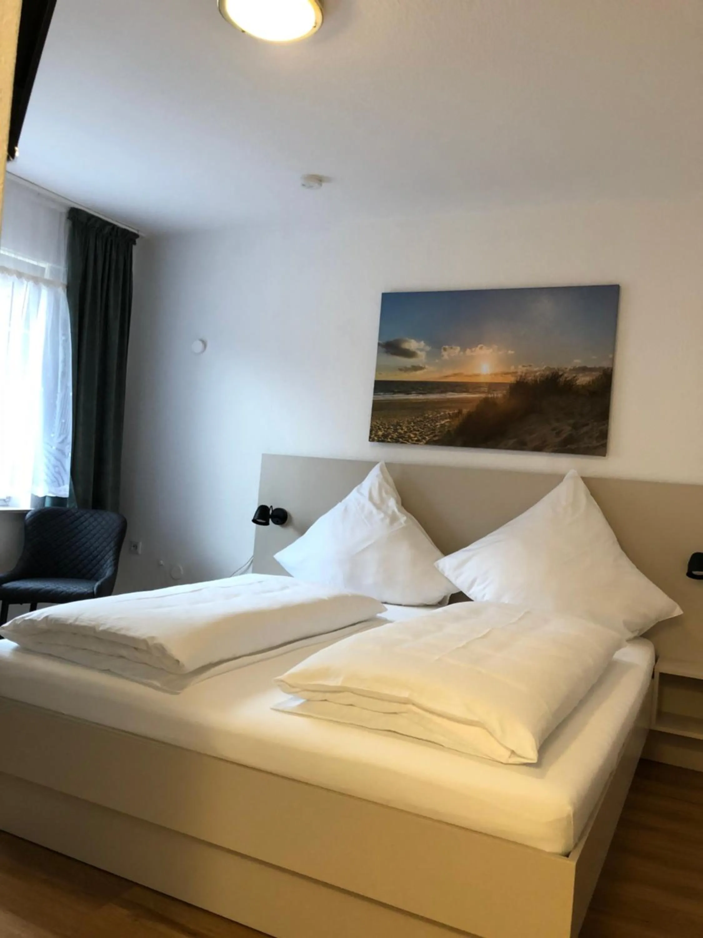 Bed in pension-seegarten