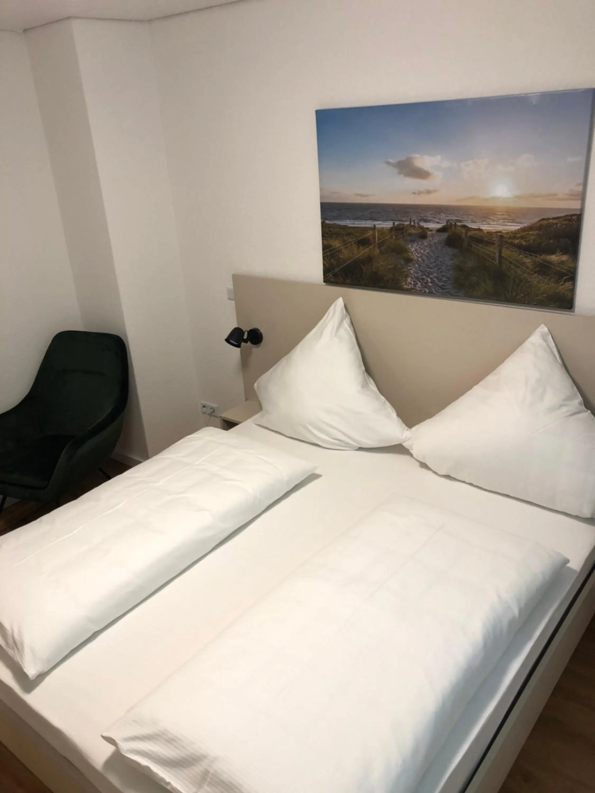 Bed in pension-seegarten