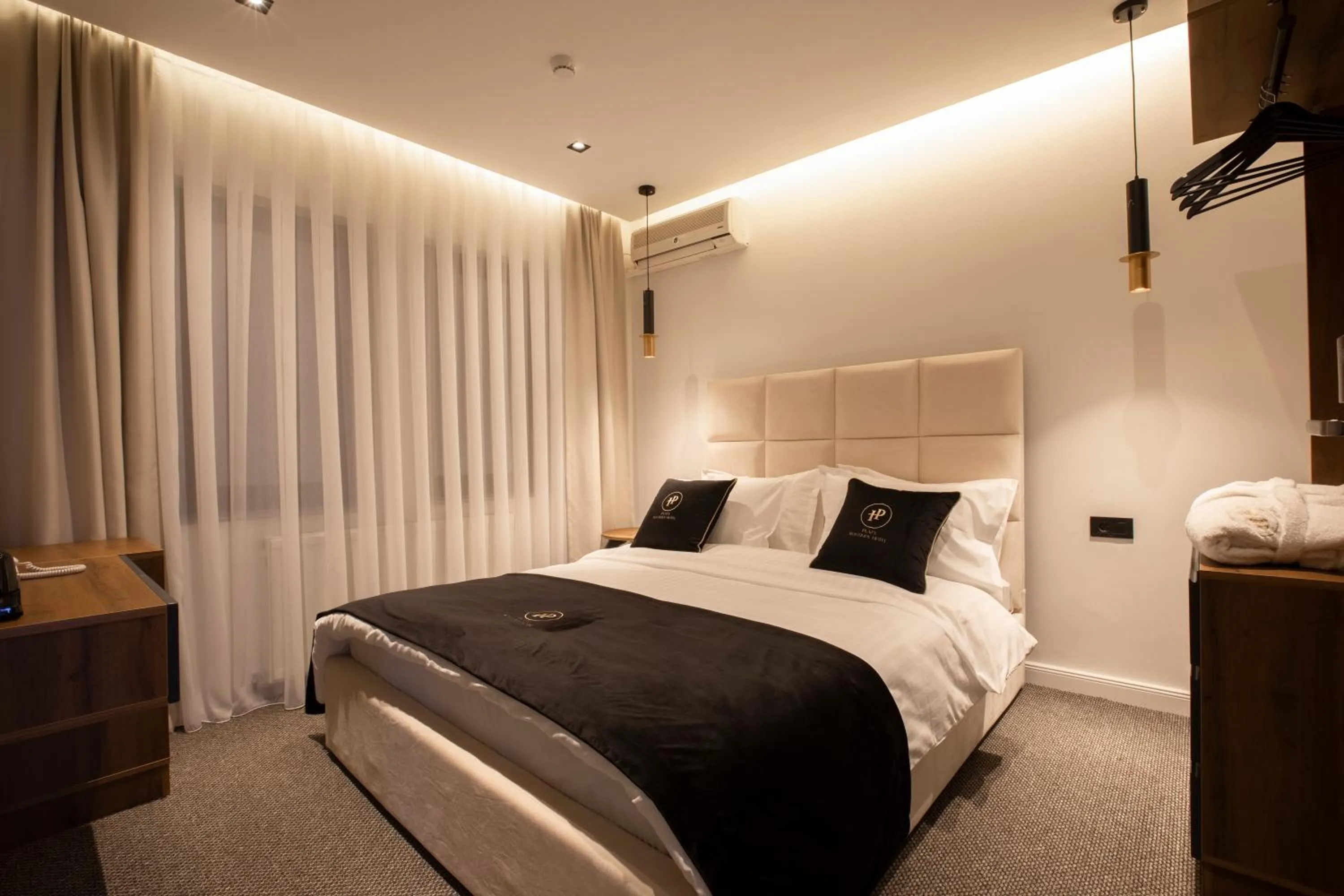 Photo of the whole room, Bed in Plaza Boutique Hotel