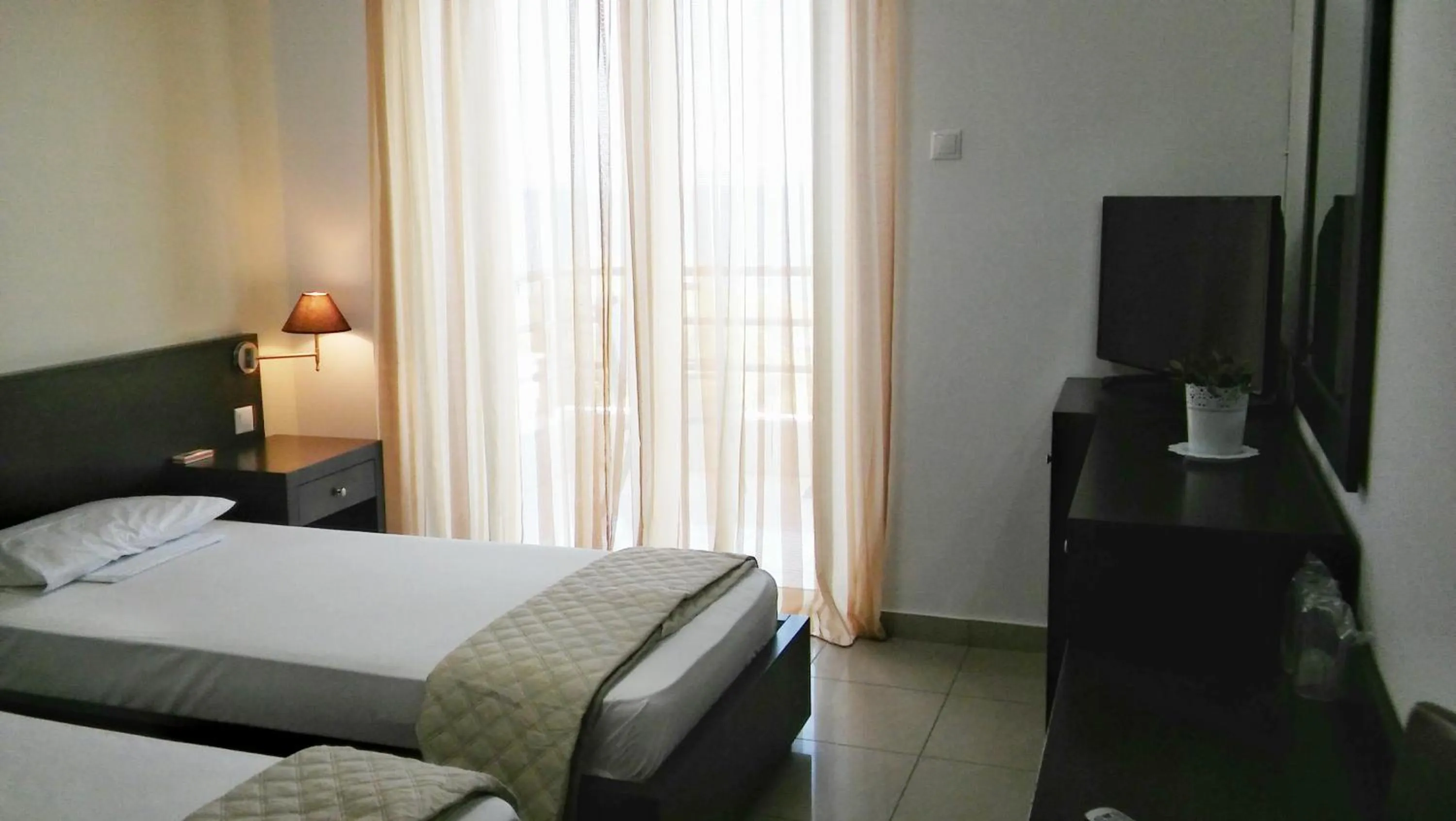 Bed in Tokalis Boutique Hotel & Spa