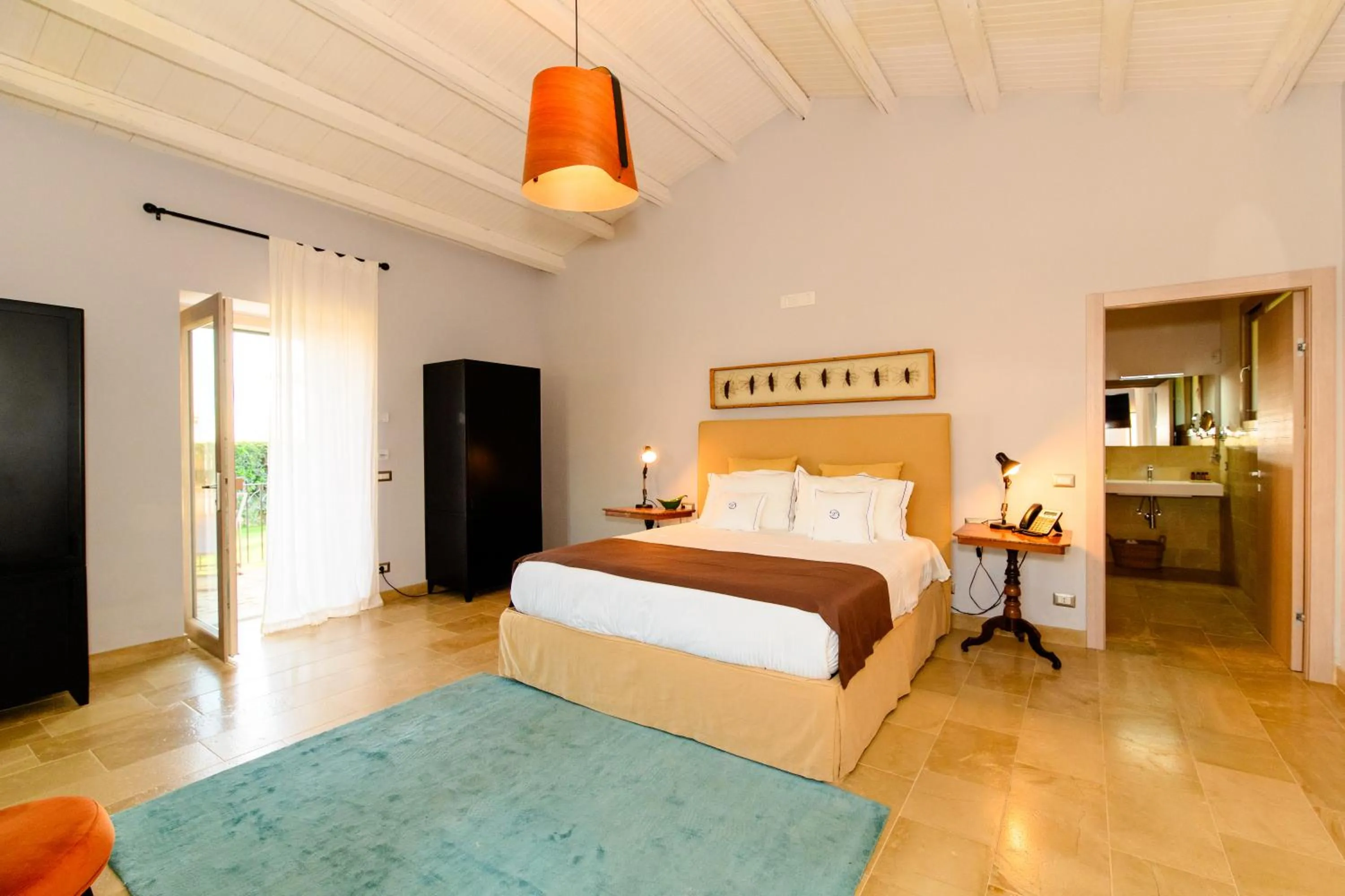 Photo of the whole room, Bed in Poggio Leano Boutique Hotel