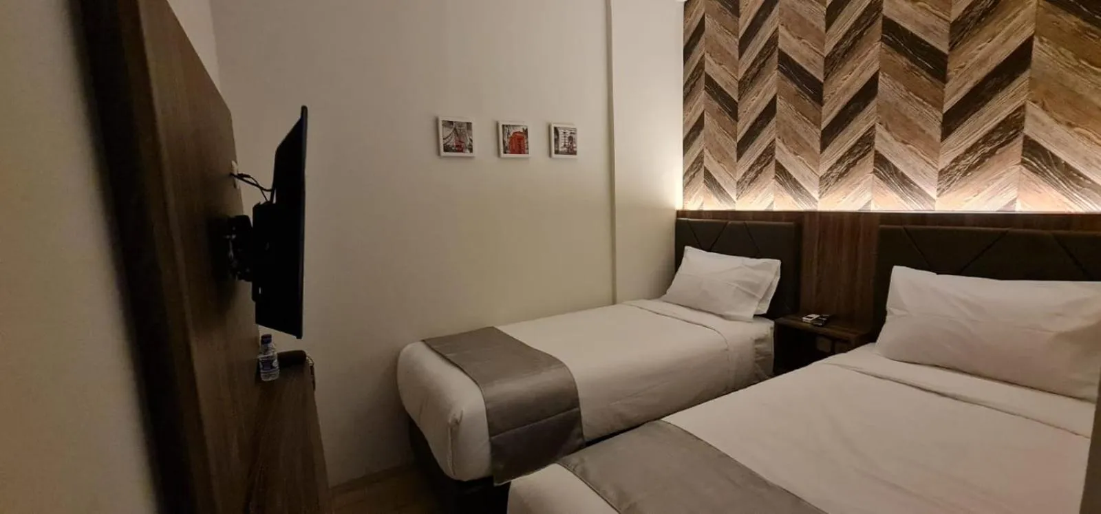 Bed in Grand Plaza Boutique Hotel