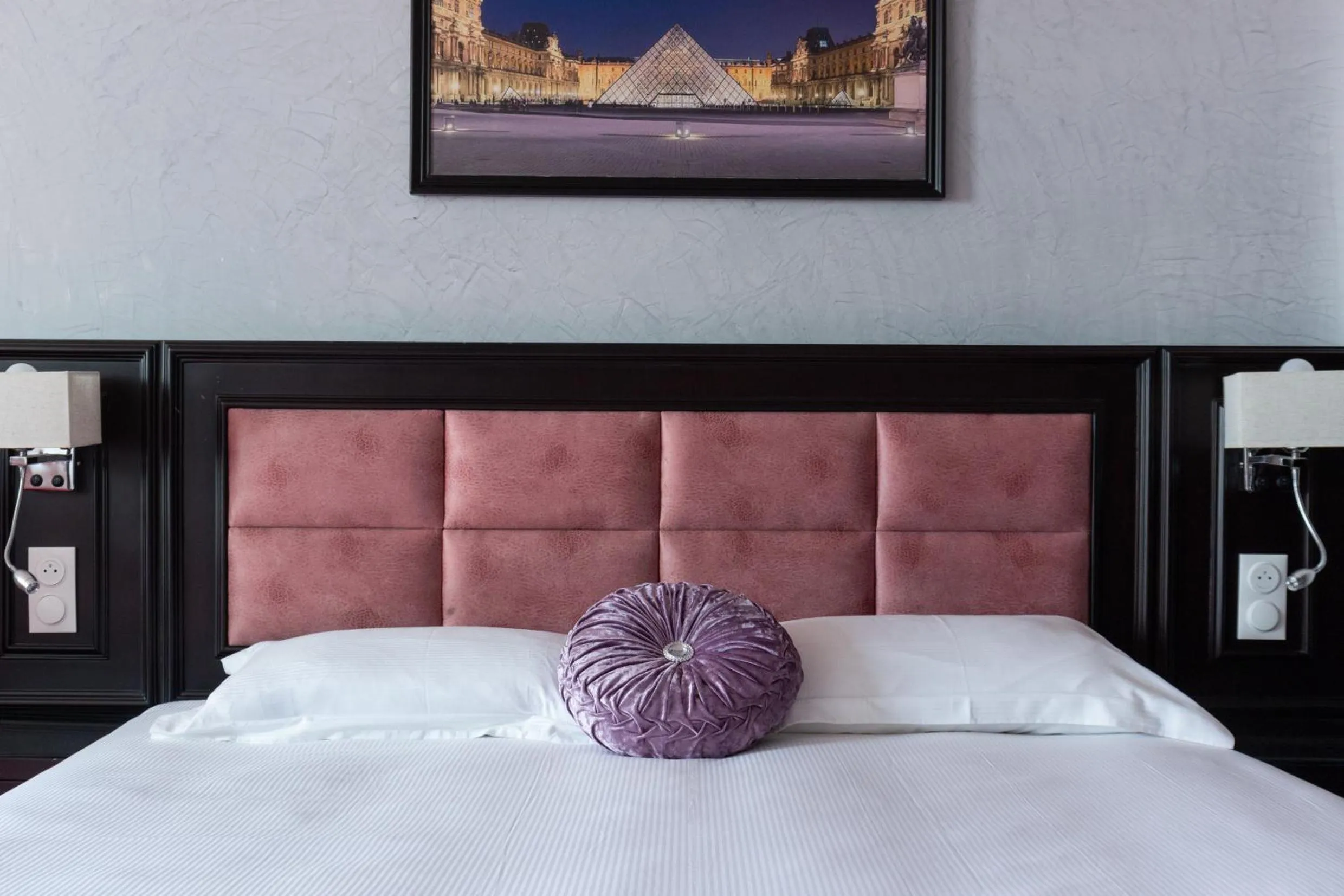 Bed in HOTEL ROYAL Paris Ivry