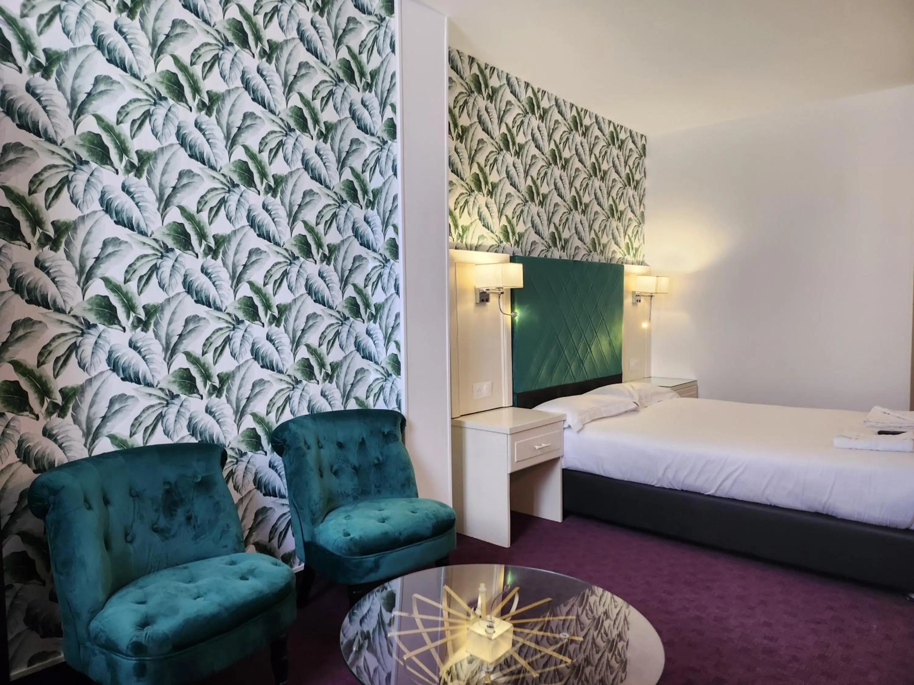 Bed in HOTEL ROYAL Paris Ivry