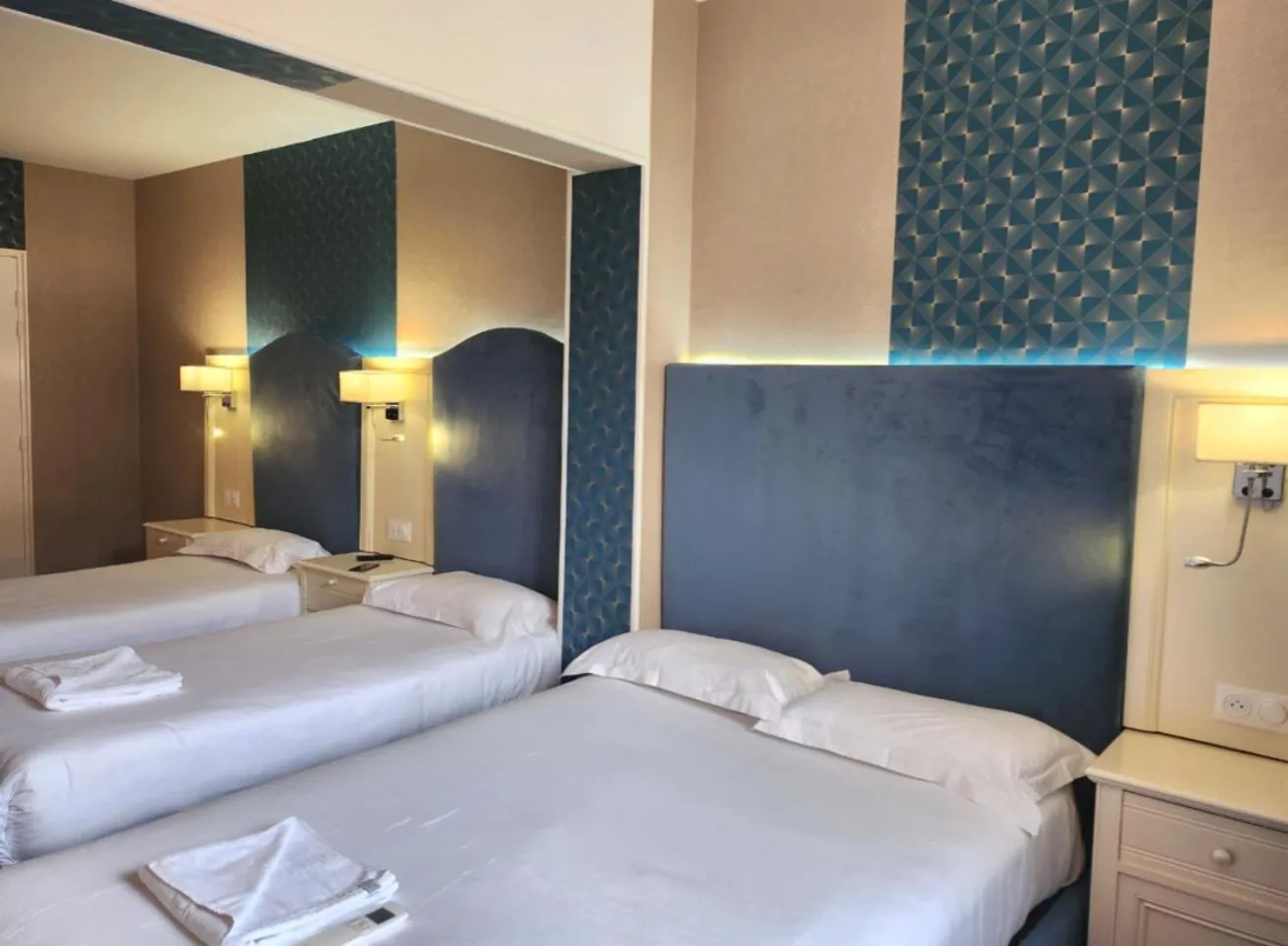 Bed in HOTEL ROYAL Paris Ivry