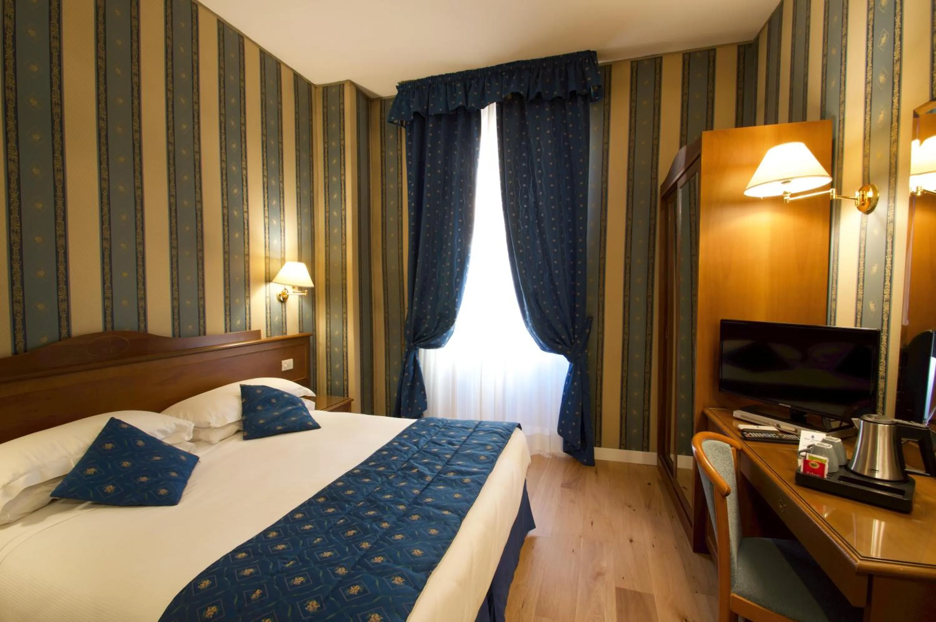 Bed in Hotel Montecarlo