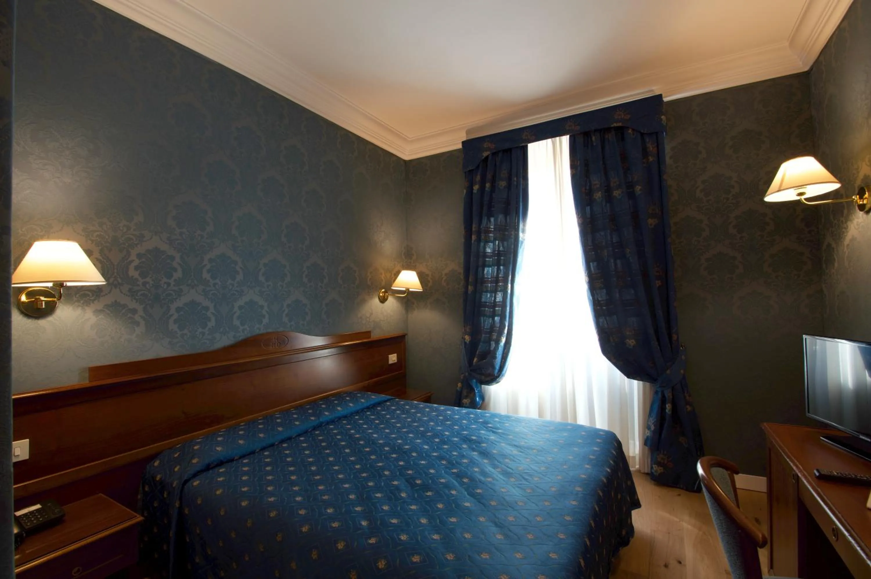 Bed in Hotel Montecarlo