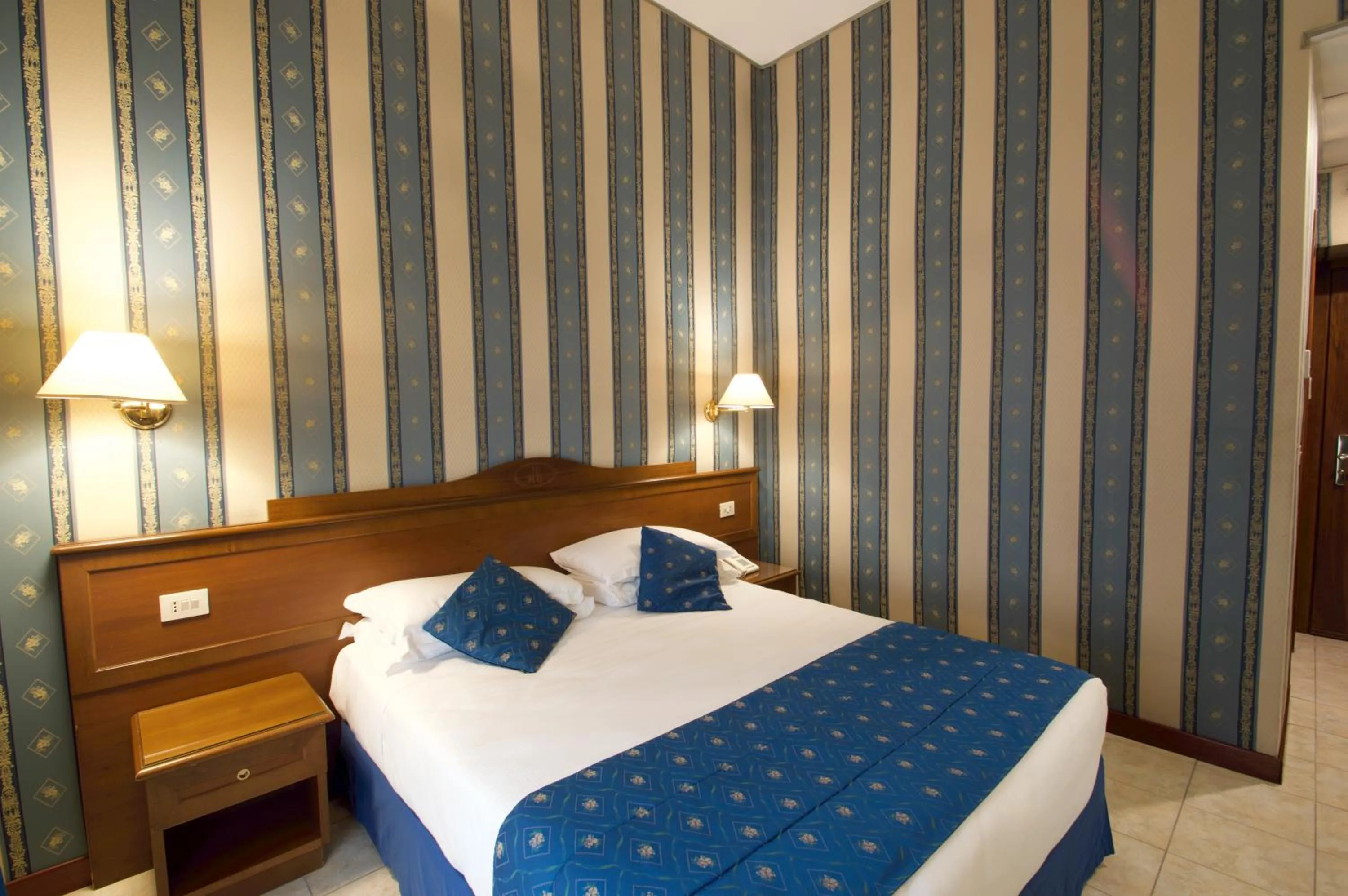 Bed in Hotel Montecarlo